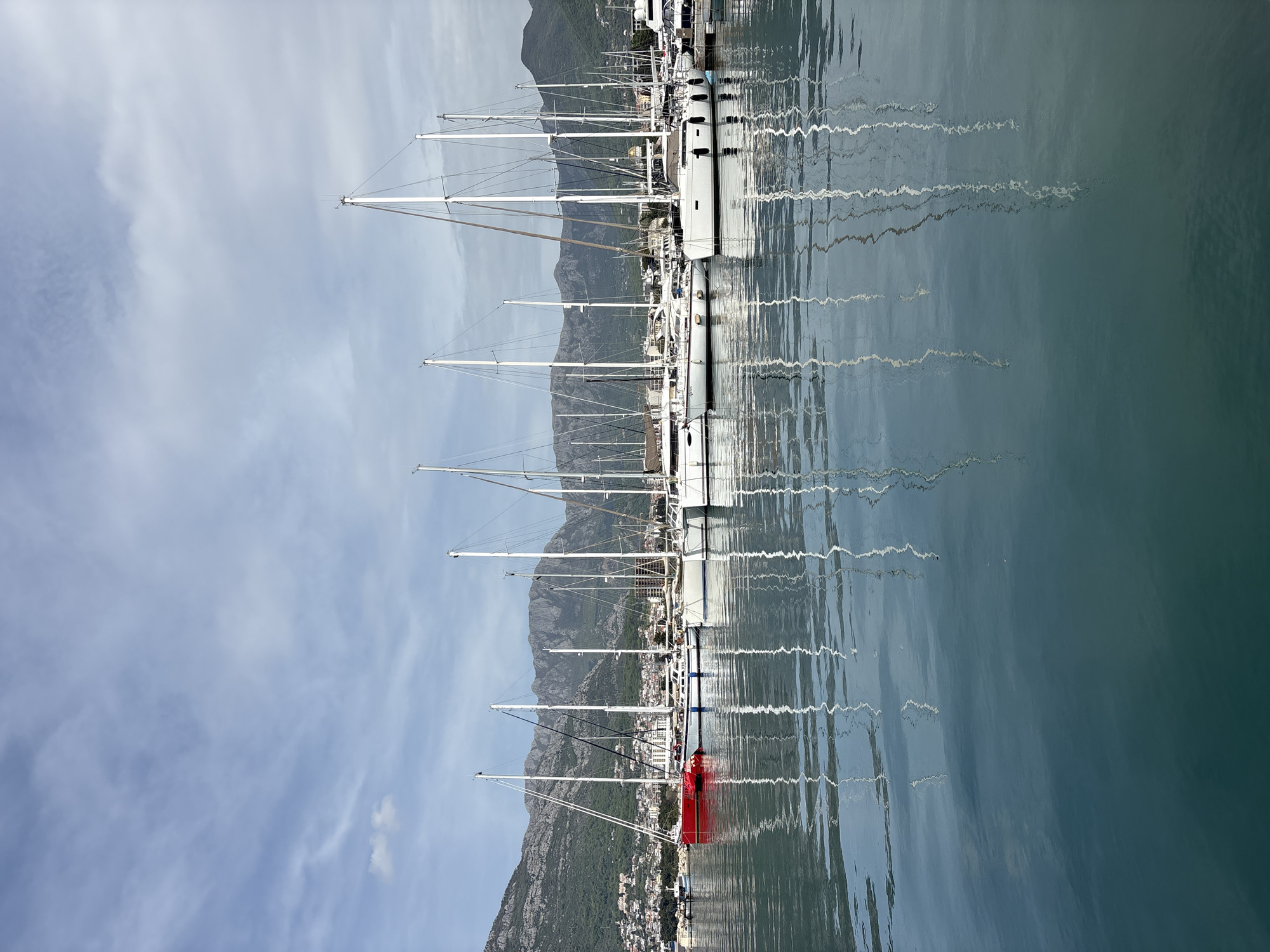 Cargo ship and sailboats observed at Bar Montenegro harbor