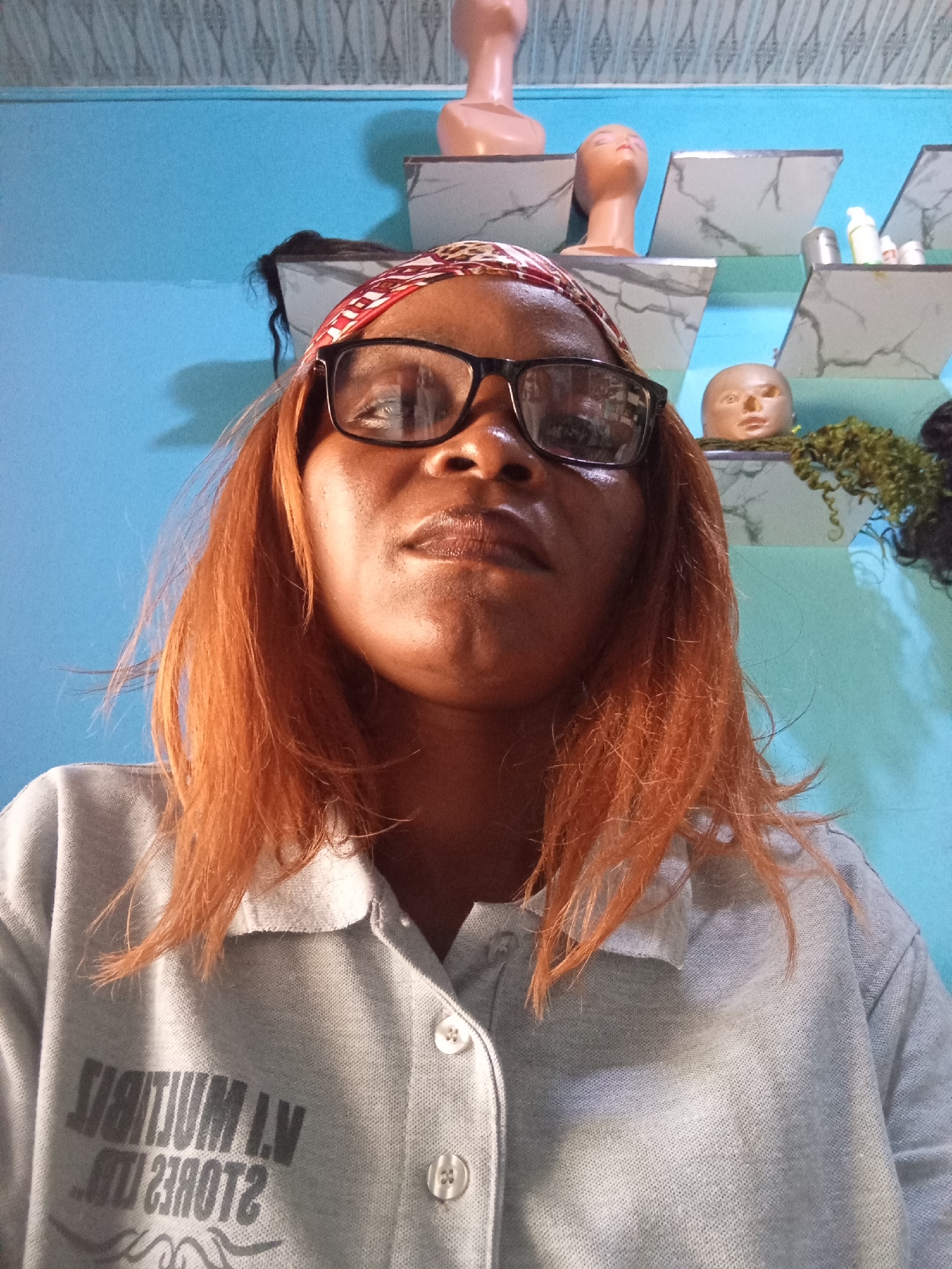 Multiple selfies inside a Jalingo retail store, July 2026