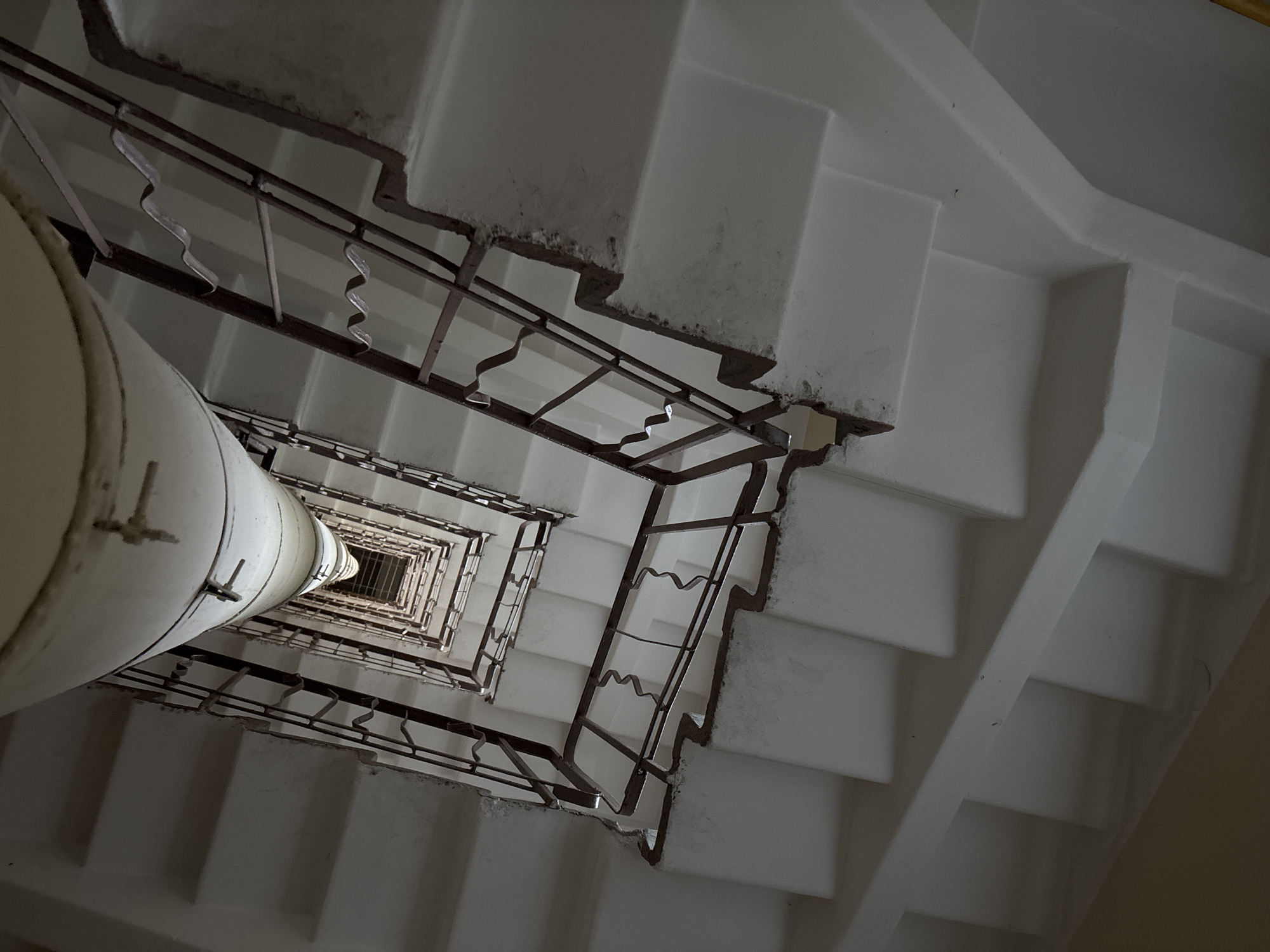 Upward view of decorative stairwell captured in Sinyavino, Russia