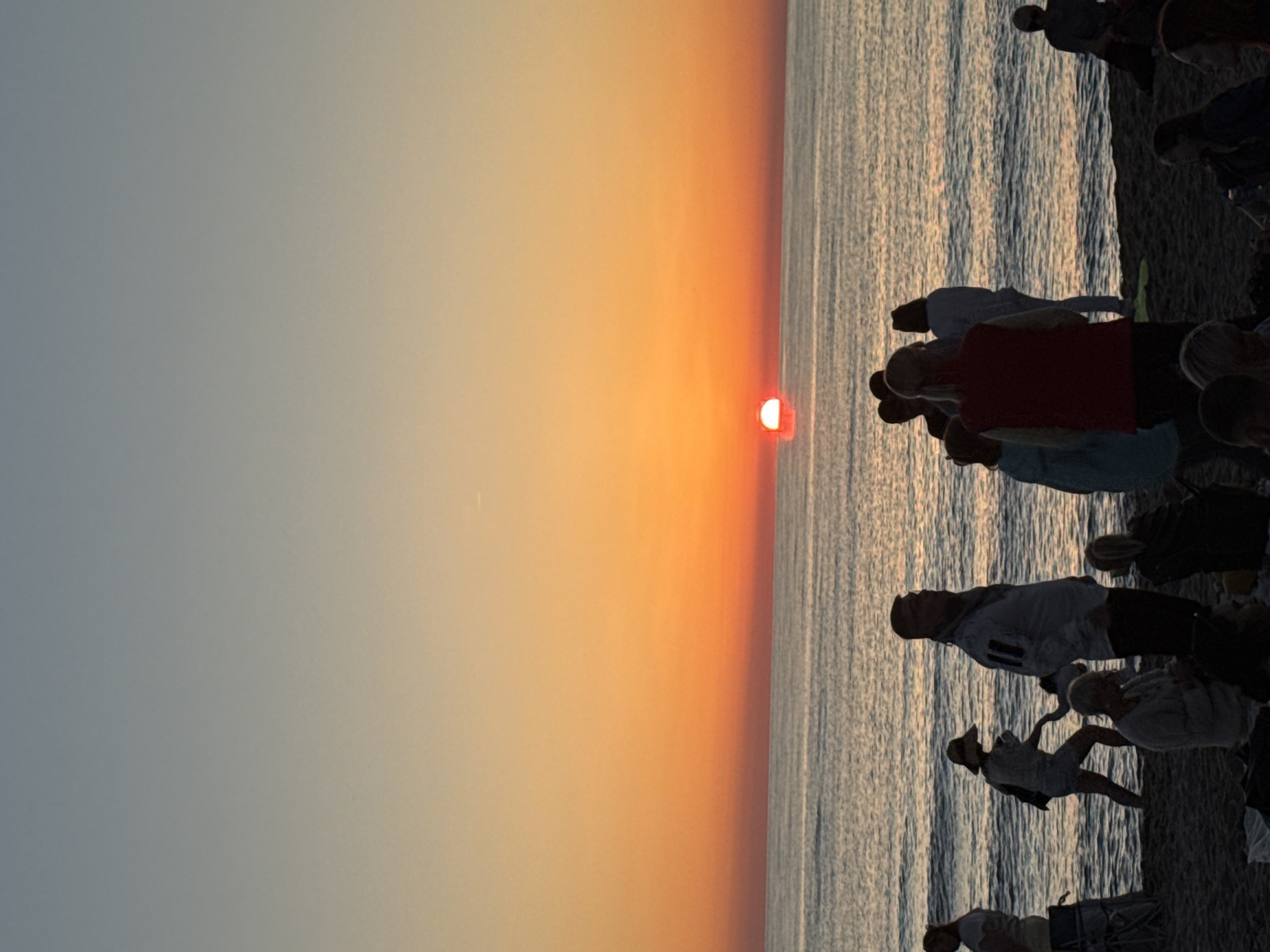 Crowded beach day turns into a yellow-themed outdoor event
