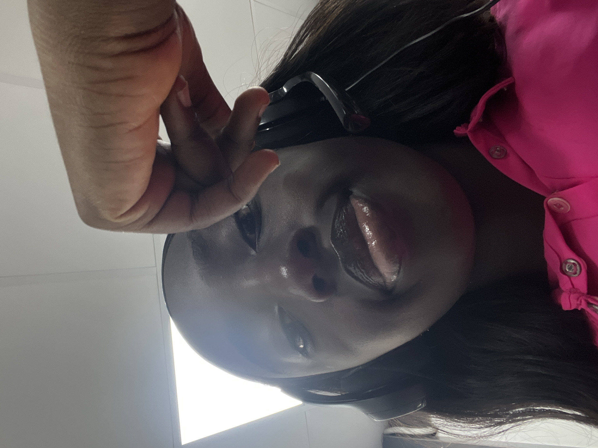 Woman Takes Playful Selfies in Elevator in Karum, Nigeria