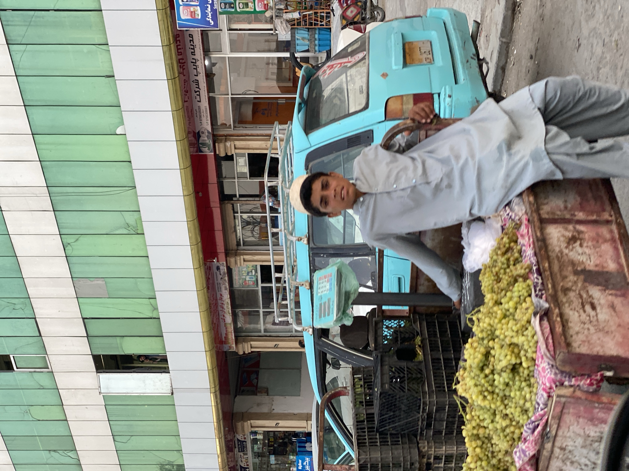 Street life in Kandahar: vendors, pedestrians, and daily movement