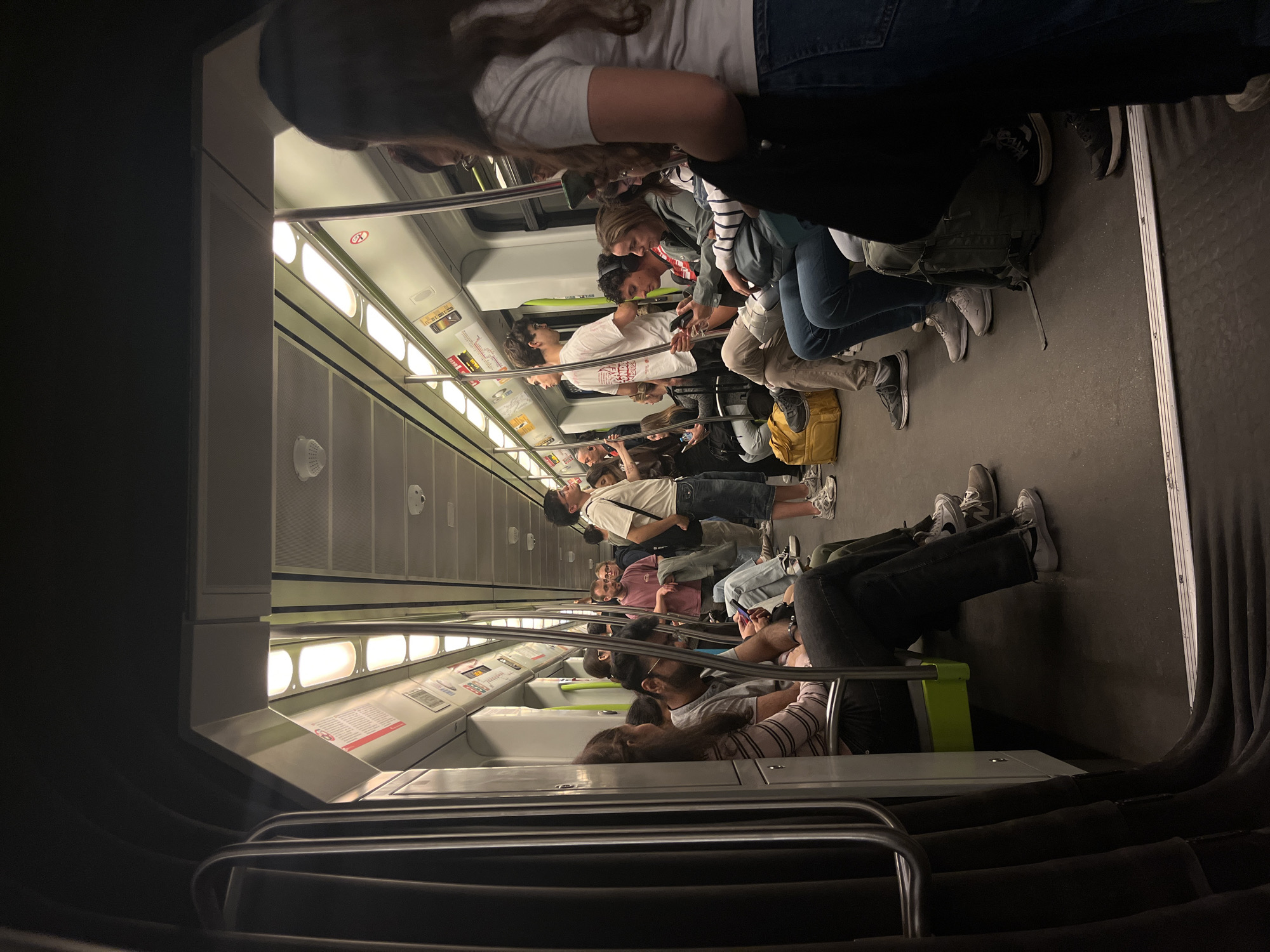Moderately crowded metro train observed in Valencia Friday evening