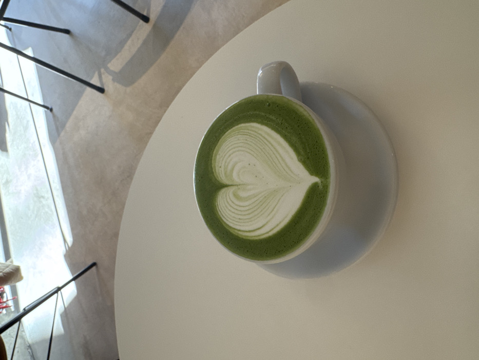 Heart-shaped latte art spotted on matcha drink in Tokyo