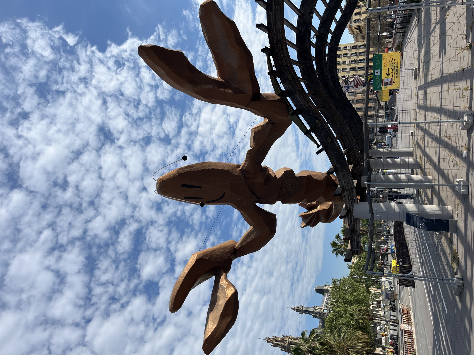 Barcelona street scenes feature lobster sculpture, decorated skateboards