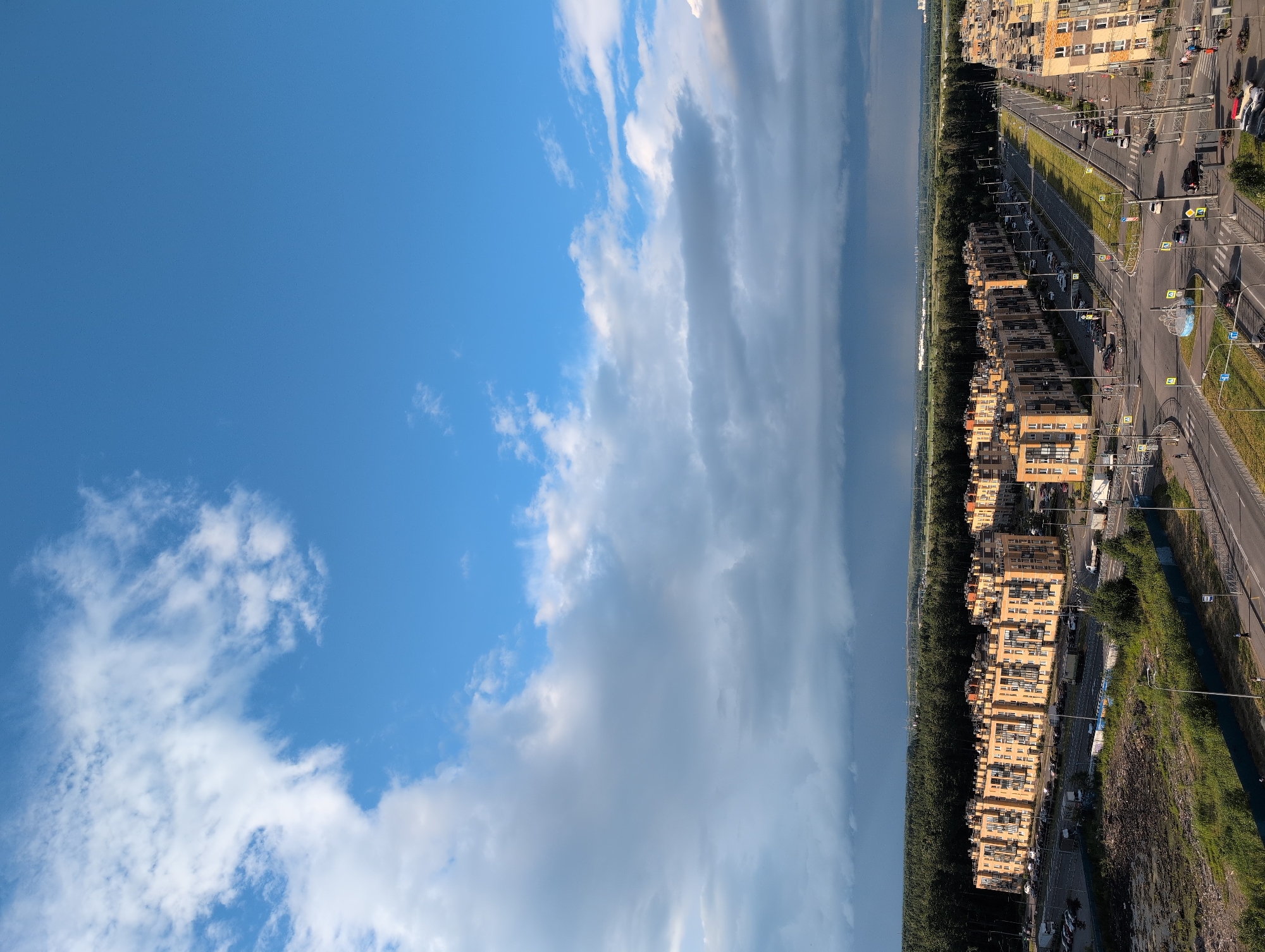 Storm, rainbows, and sunset over Saint Petersburg's residential skyline