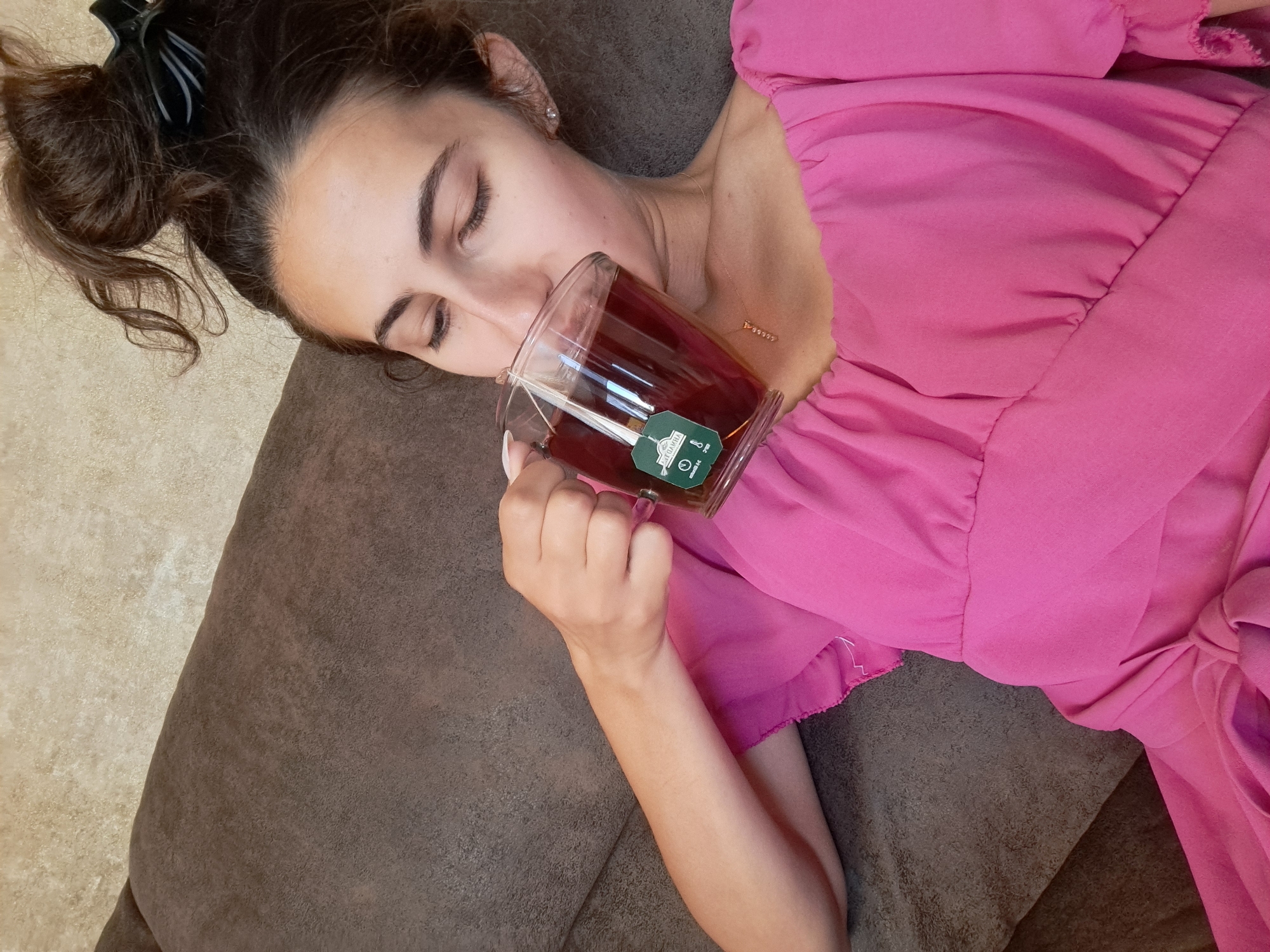 Woman enjoys morning tea and fresh strawberries in Bulgarian village
