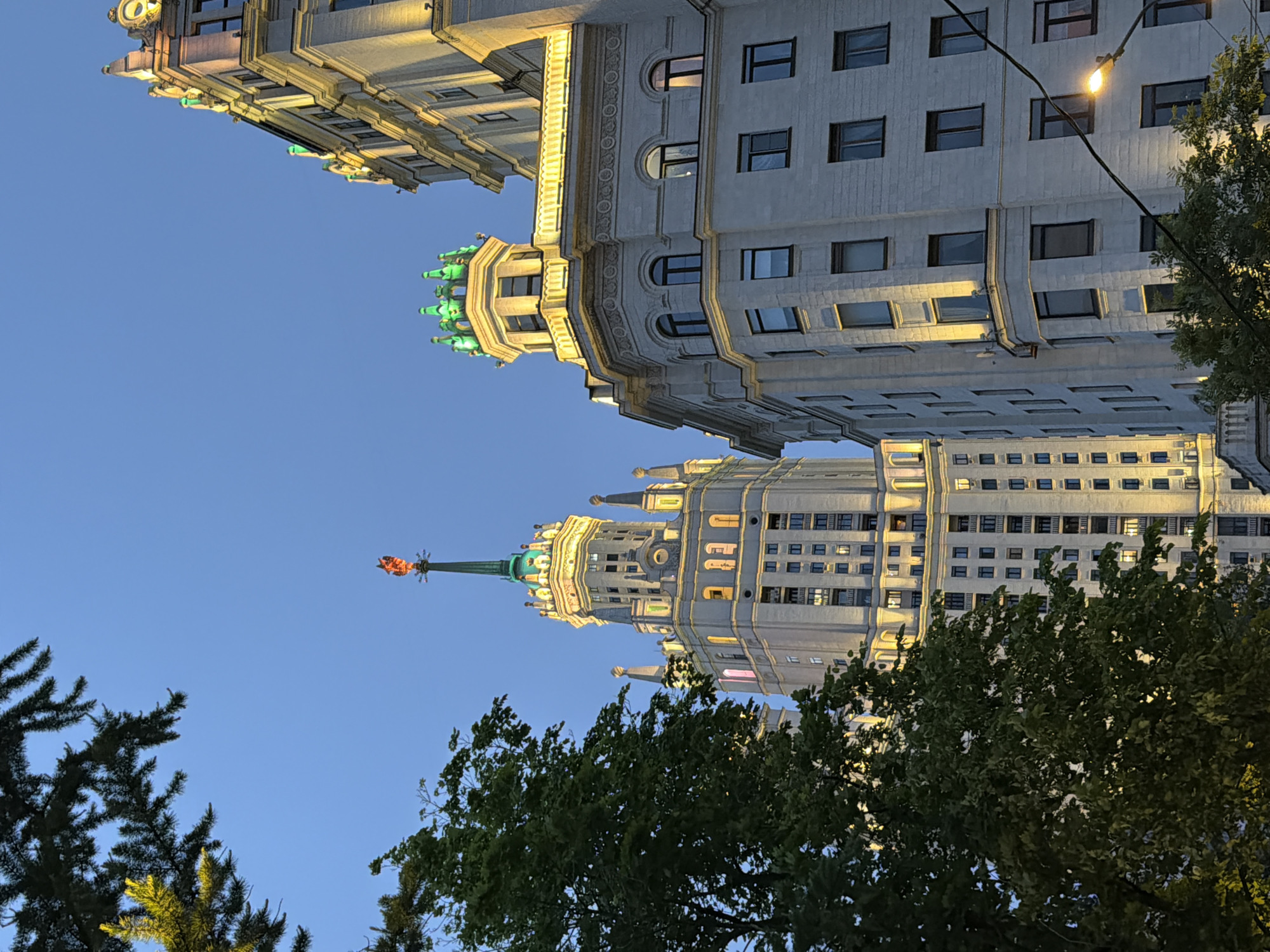 Monumental buildings photographed at twilight in Ukrainian settlement