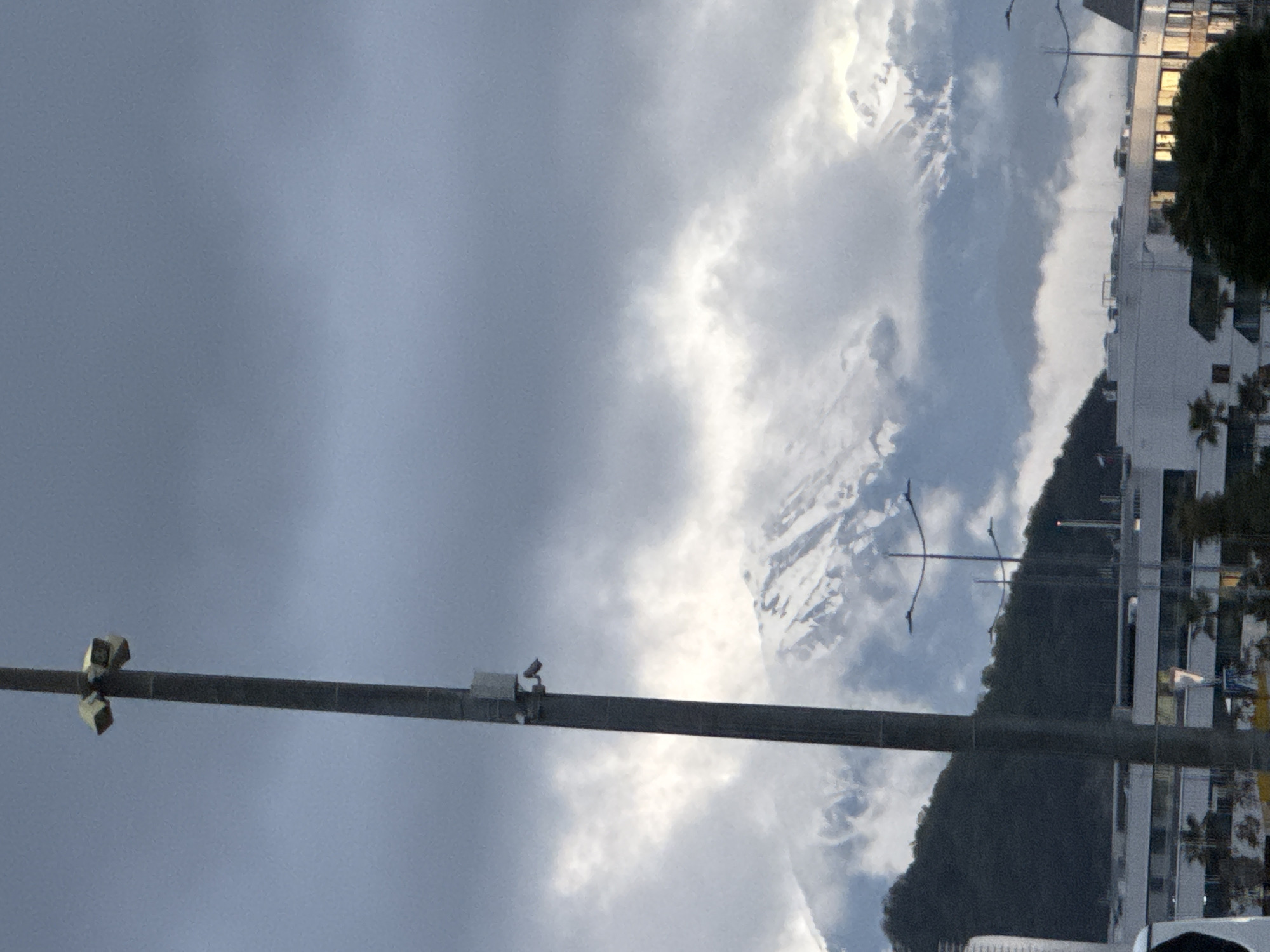 Cloudy afternoon view captures Sochi mountains and urban landscape