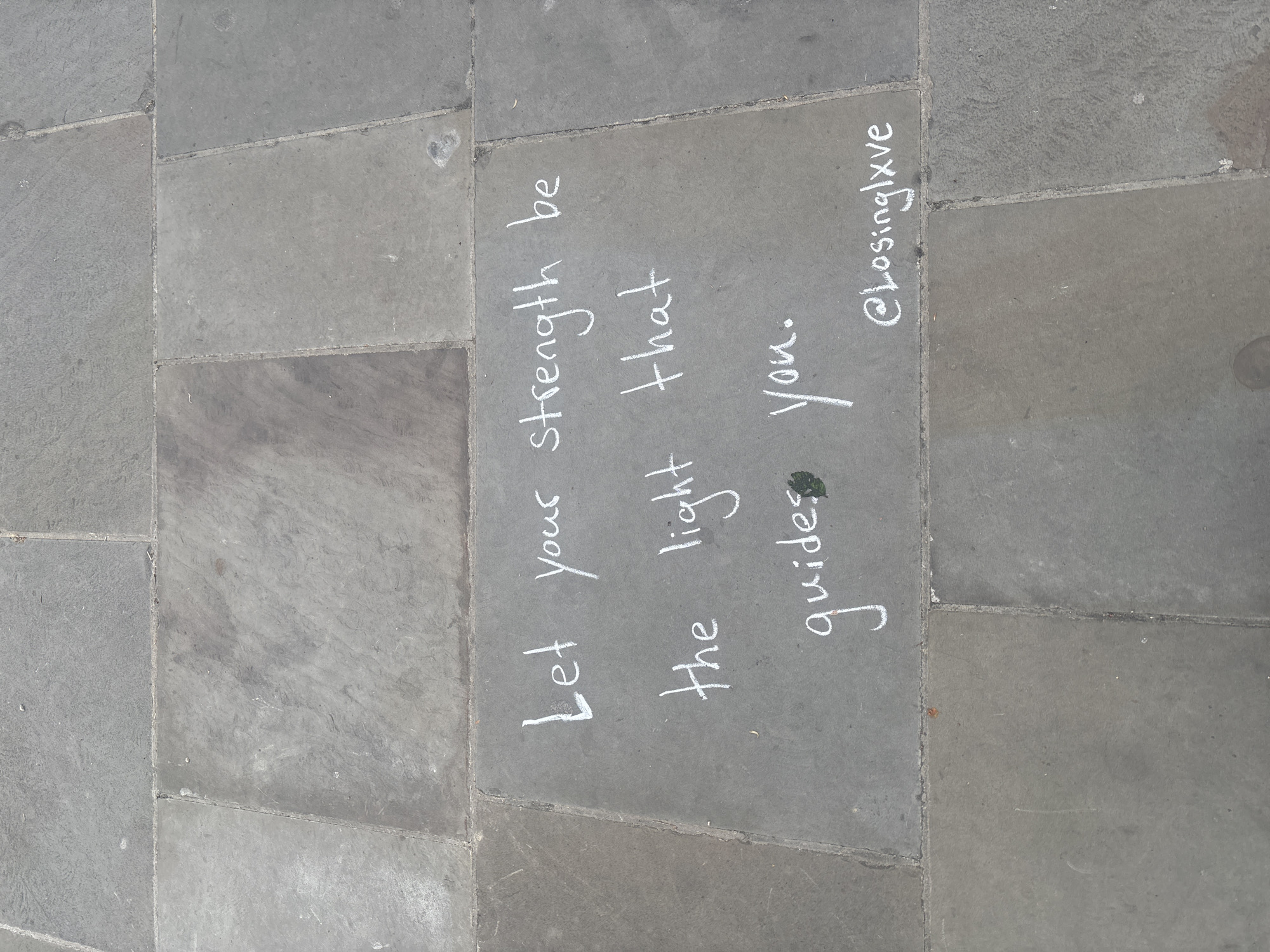 London sidewalk paving stones documented in ground-level view