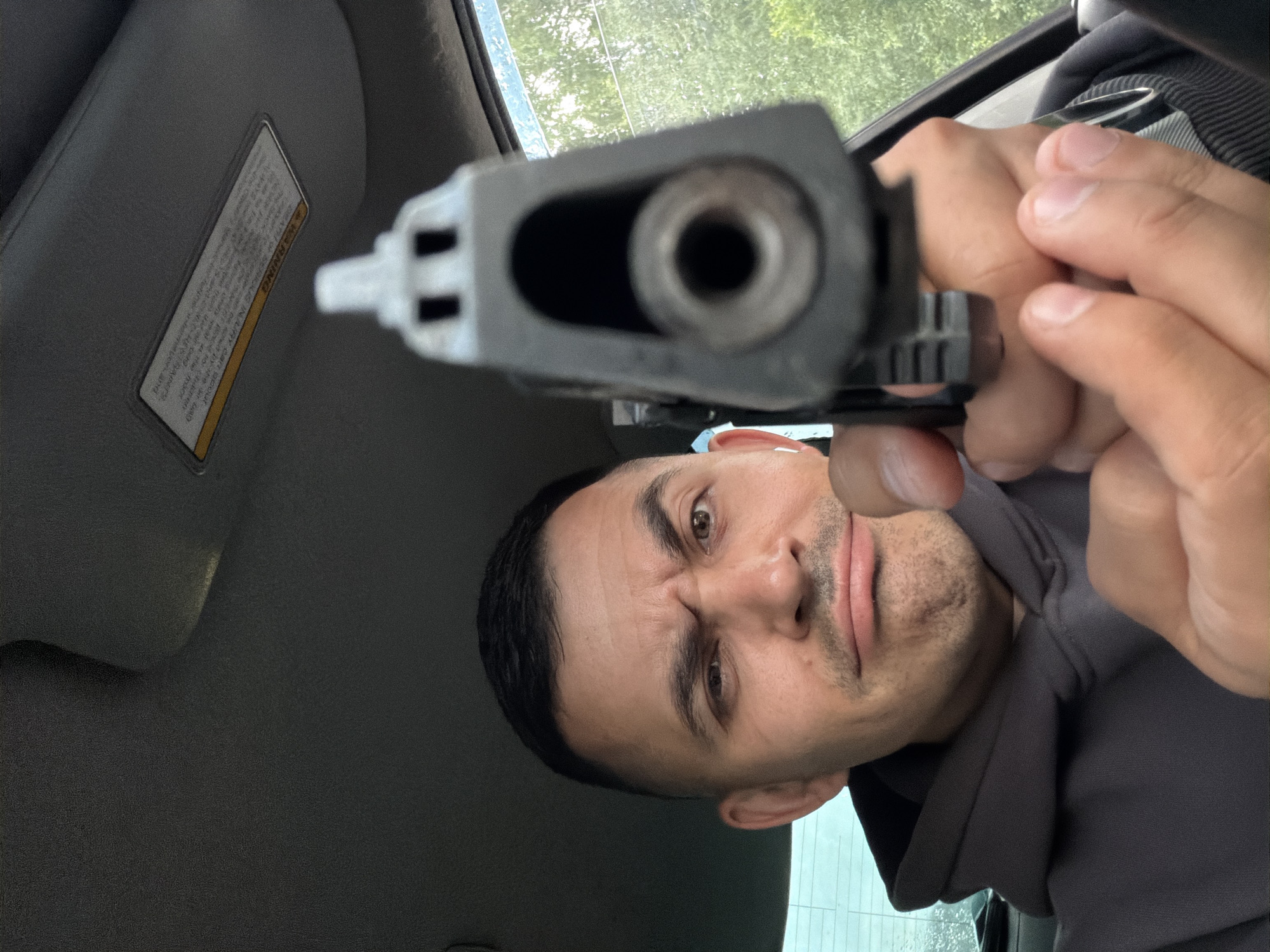 Car selfie session in Izhevsk includes repeated handgun display