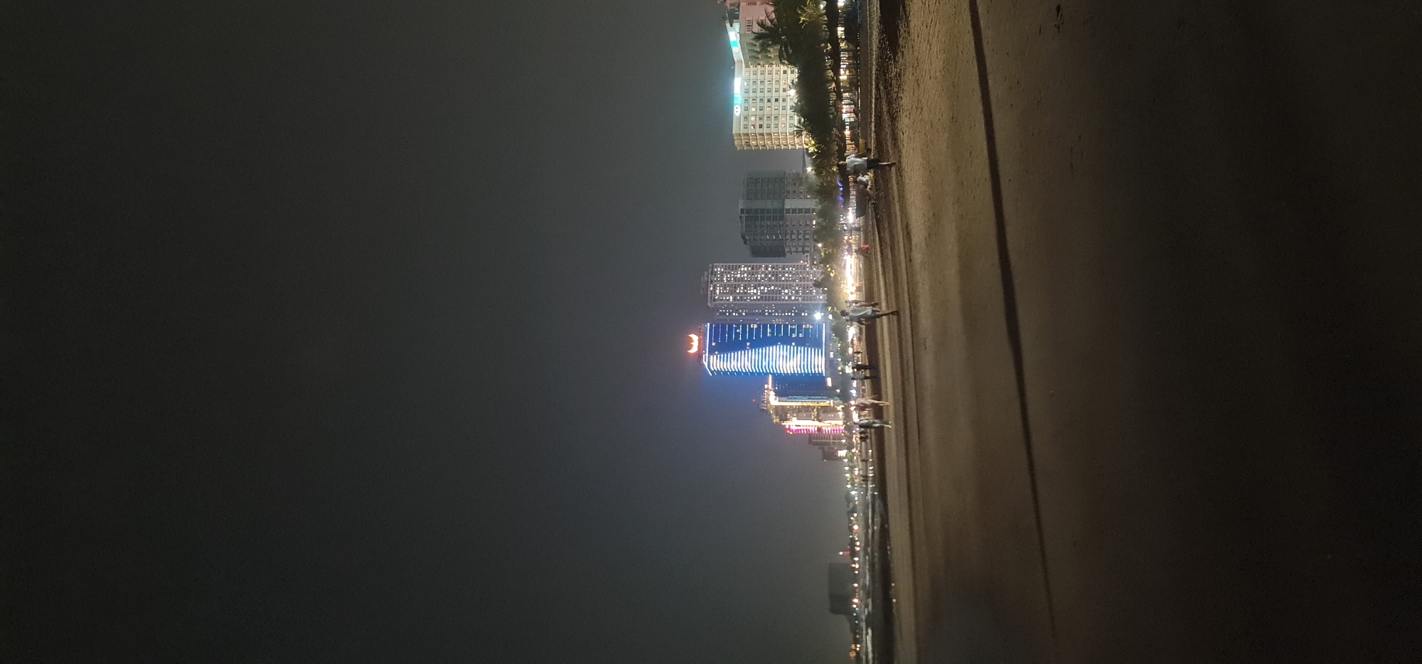Nighttime beach scene observed in Đà Nẵng, Vietnam
