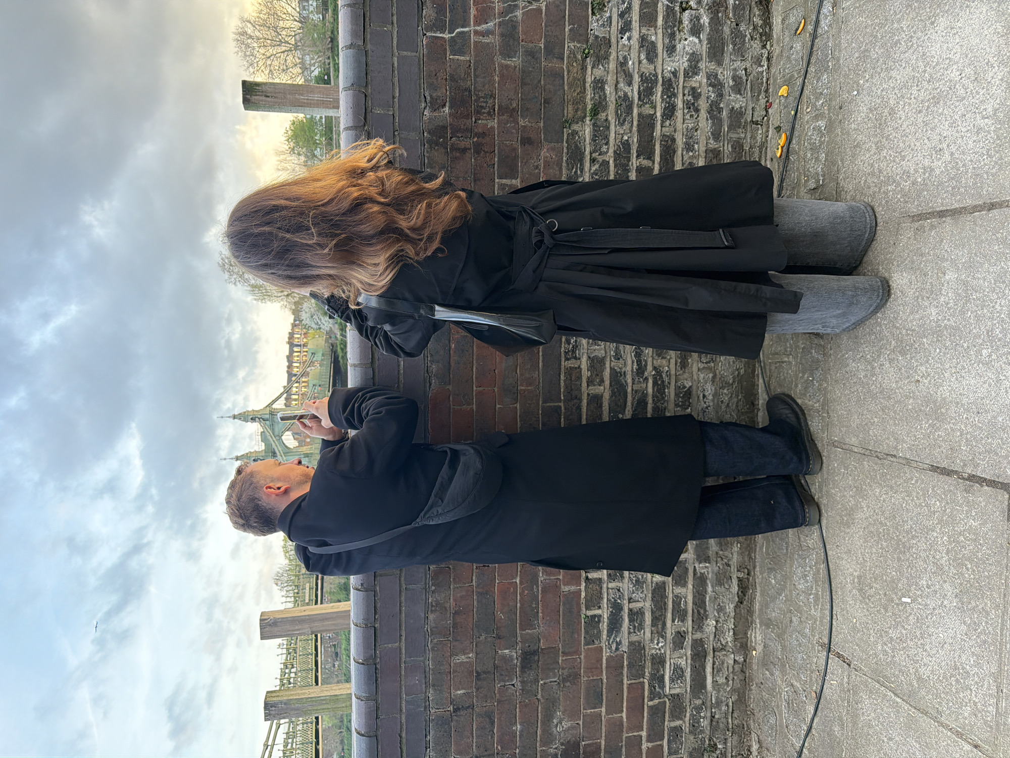 Two people spotted standing by Hammersmith Bridge railing