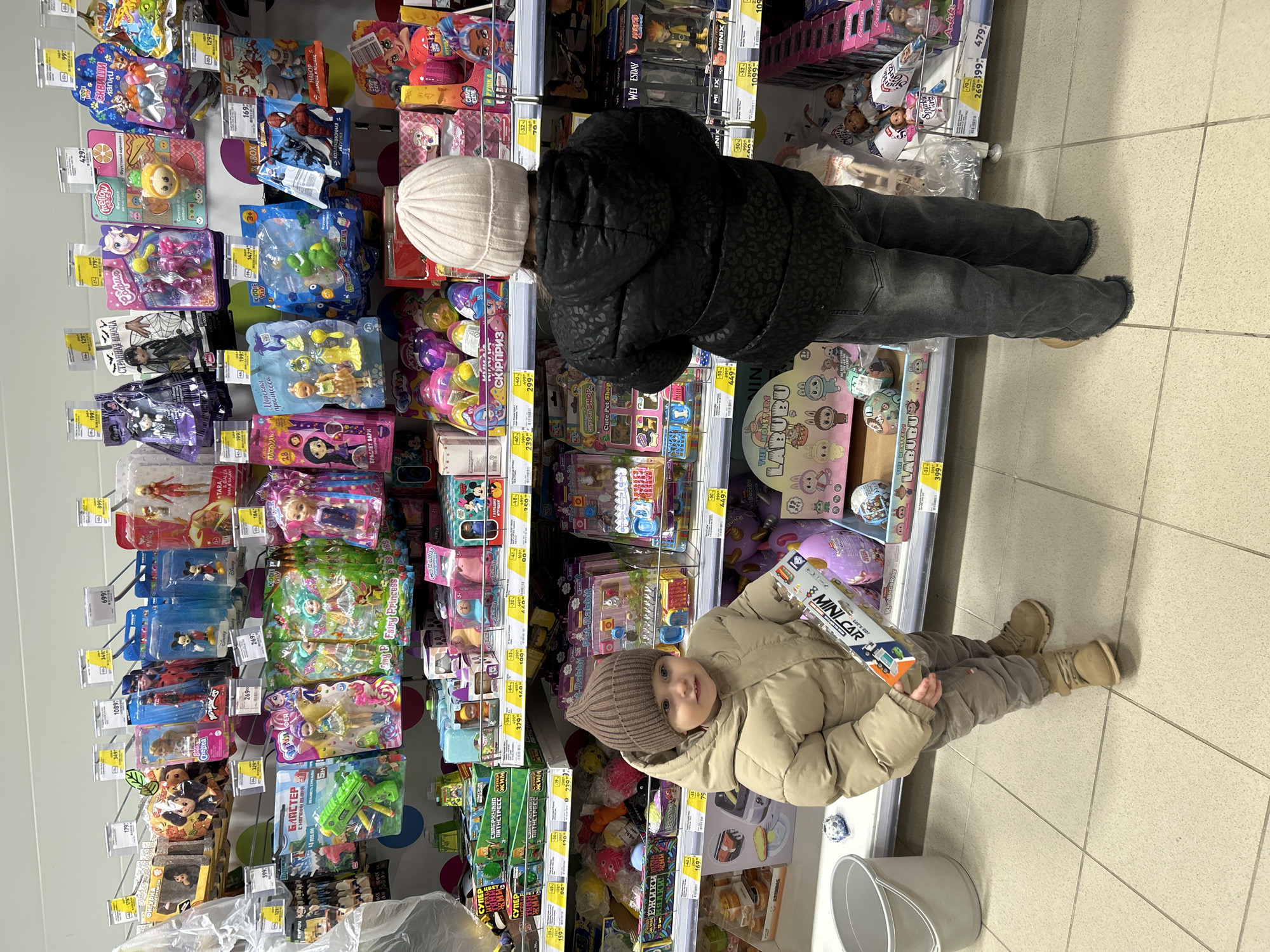 Children browse toy aisle in Klin, Russia store