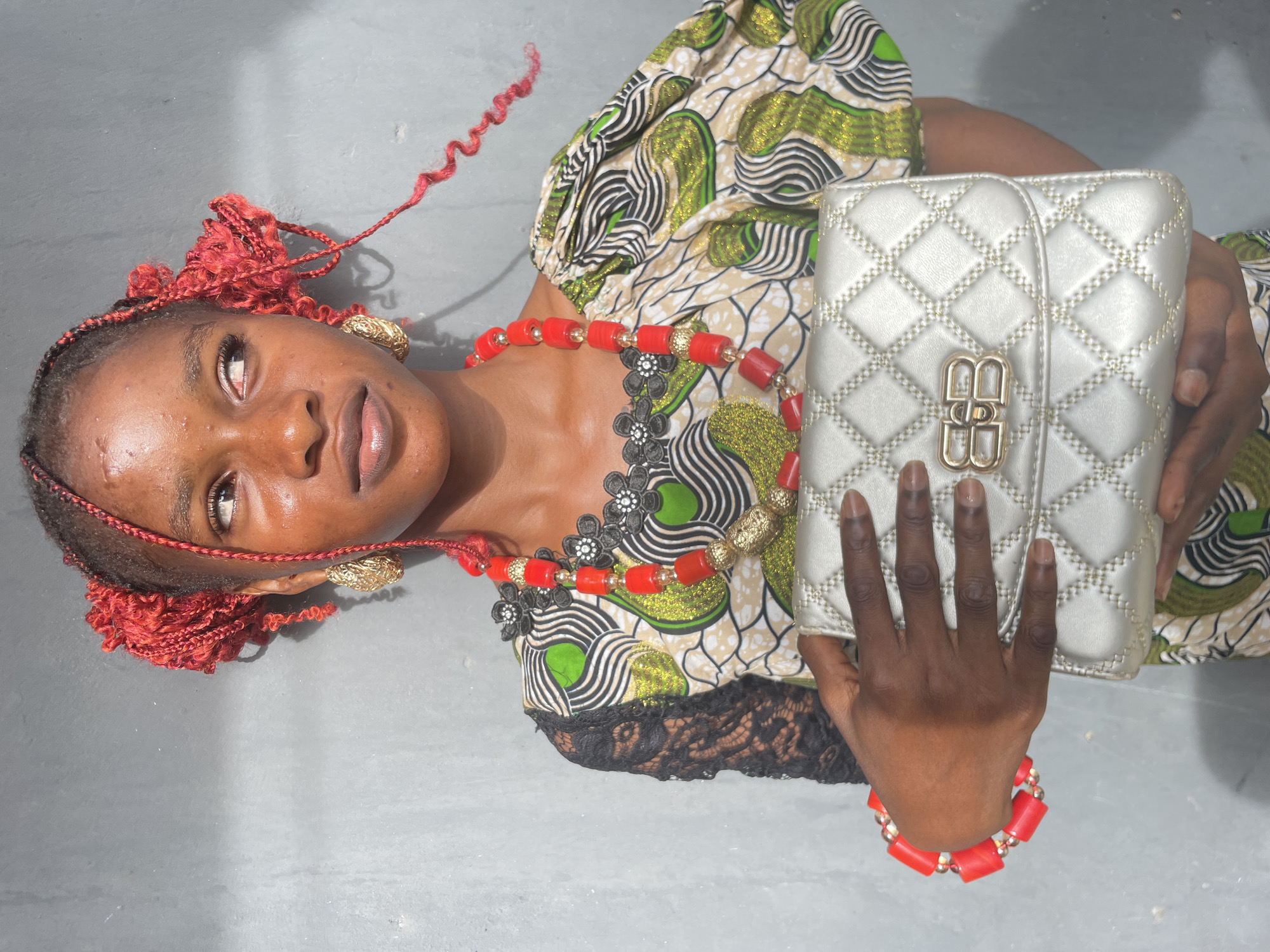 Portrait session documents woman in traditional attire in Badagry