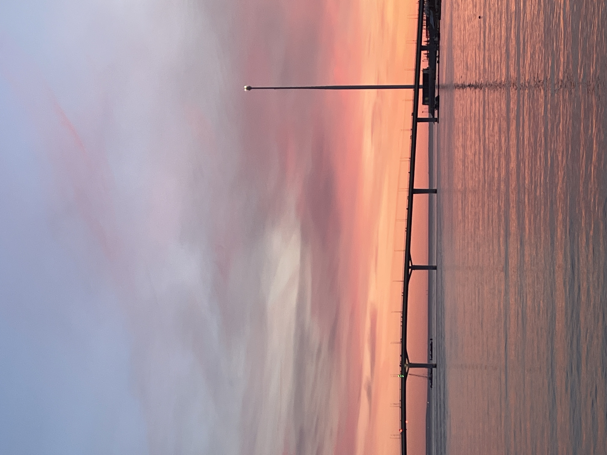 Sunset captured over Saint Petersburg waterfront bridge April 21