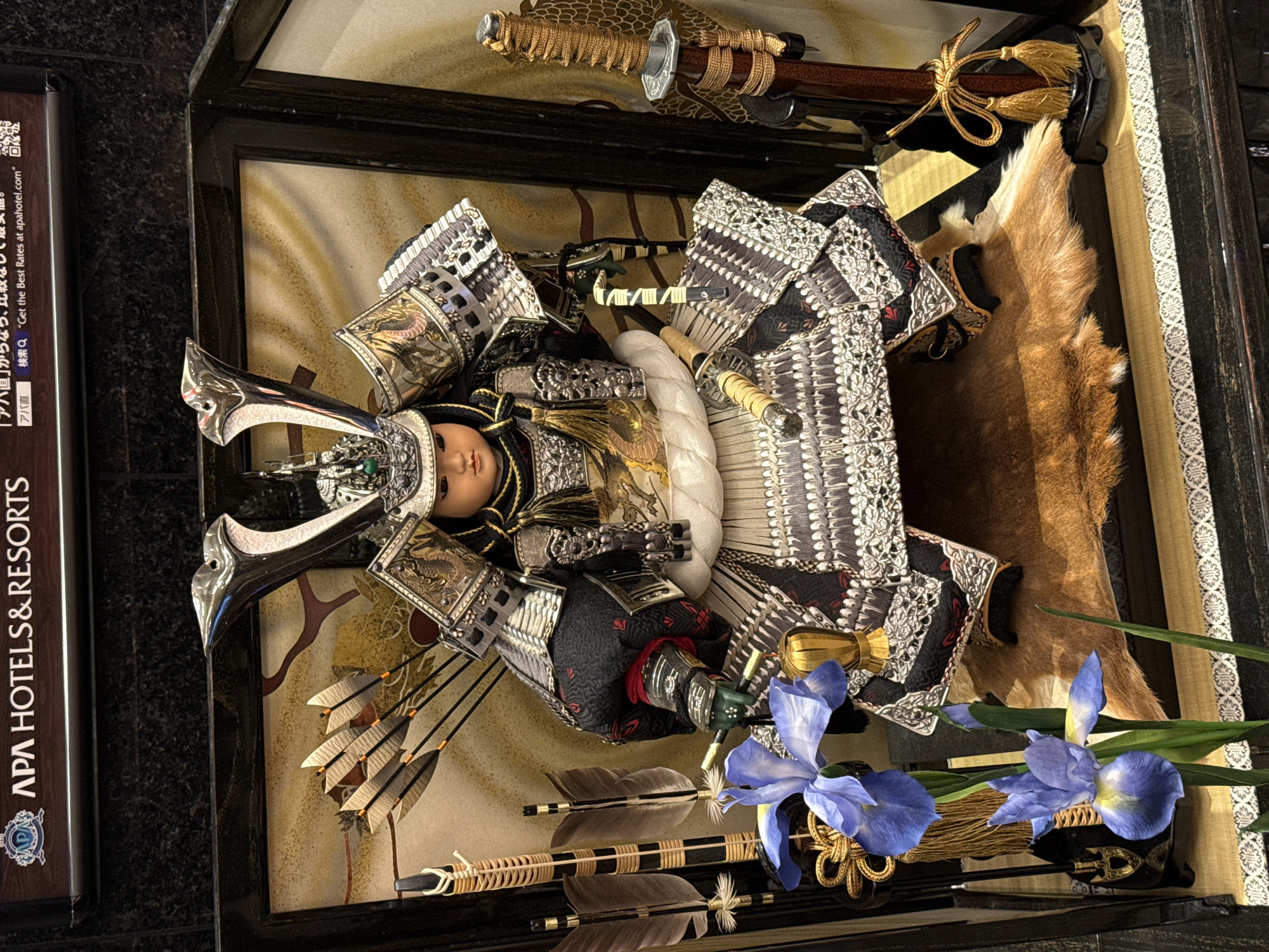 Traditional Japanese samurai doll display observed at unknown location