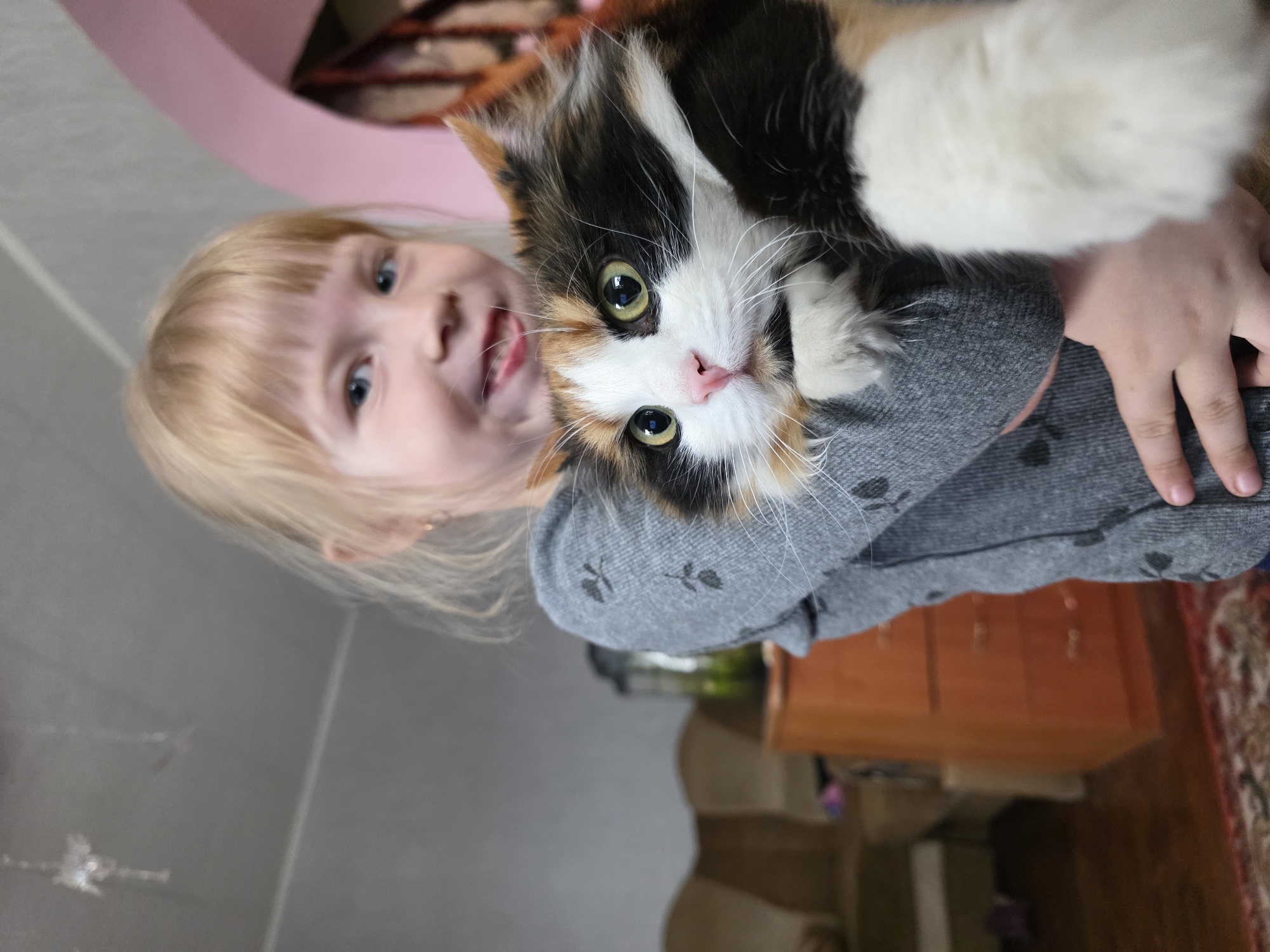 Family moments with pets captured in Chaikovsky home