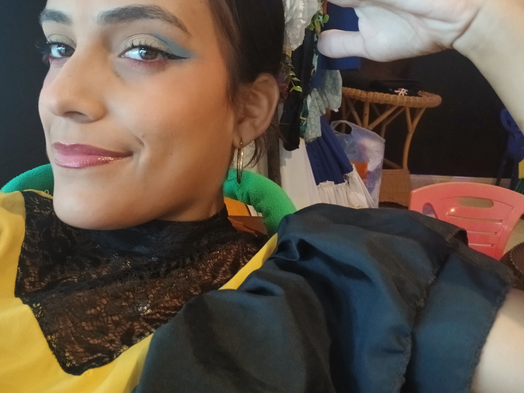 Traditional dress and makeup gathering documented at Venezuelan beach town