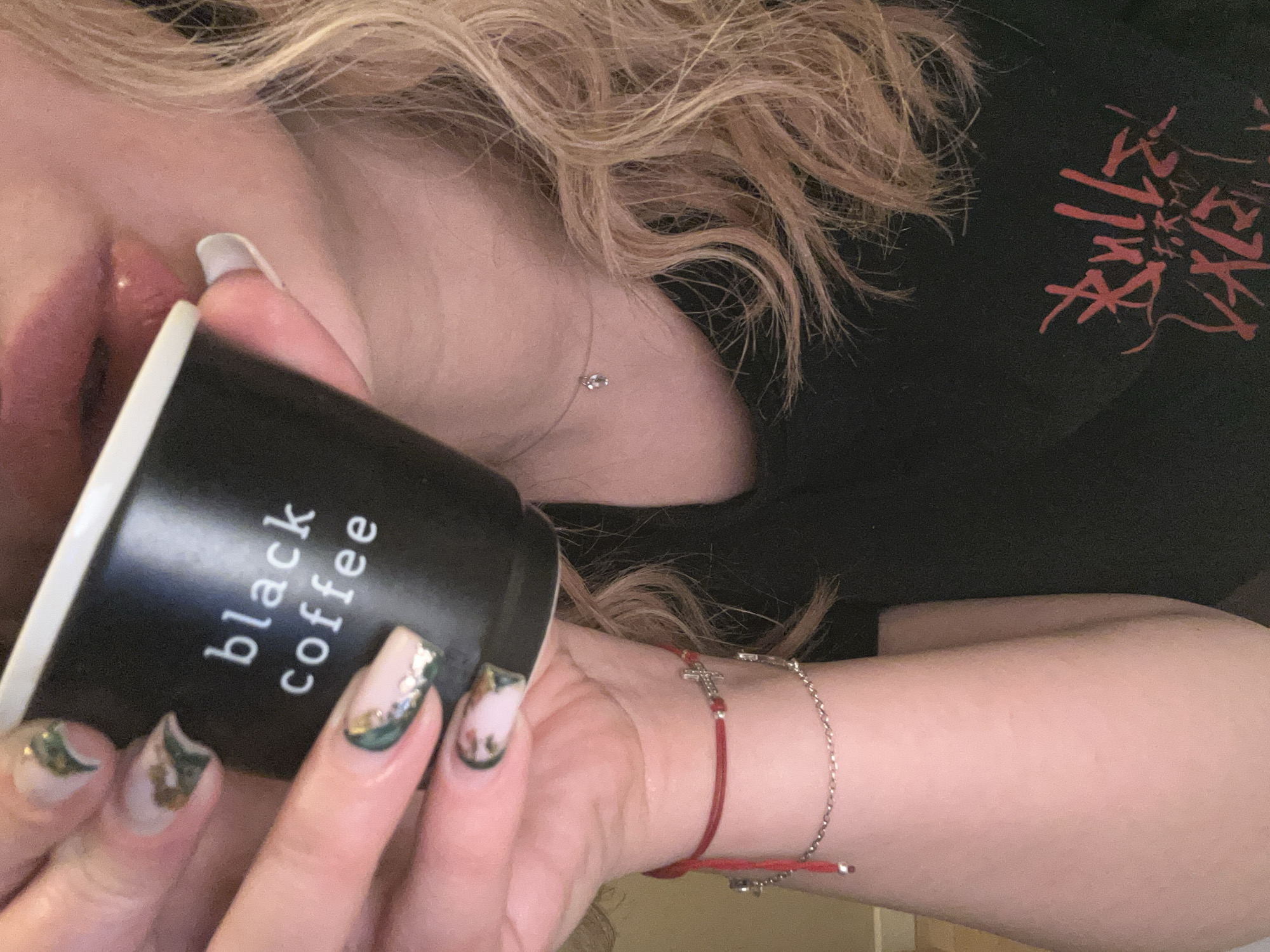 Woman with coffee and band merchandise spotted in Plovdiv