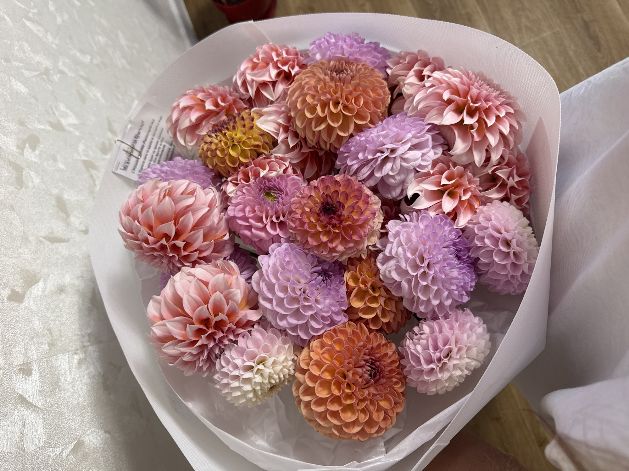 Colorful dahlia bouquet held in Kremenchuk, Ukraine