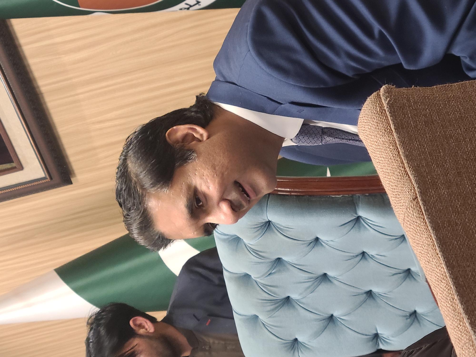 Indoor scenes documented in Quetta including formal meeting, overgrown yard