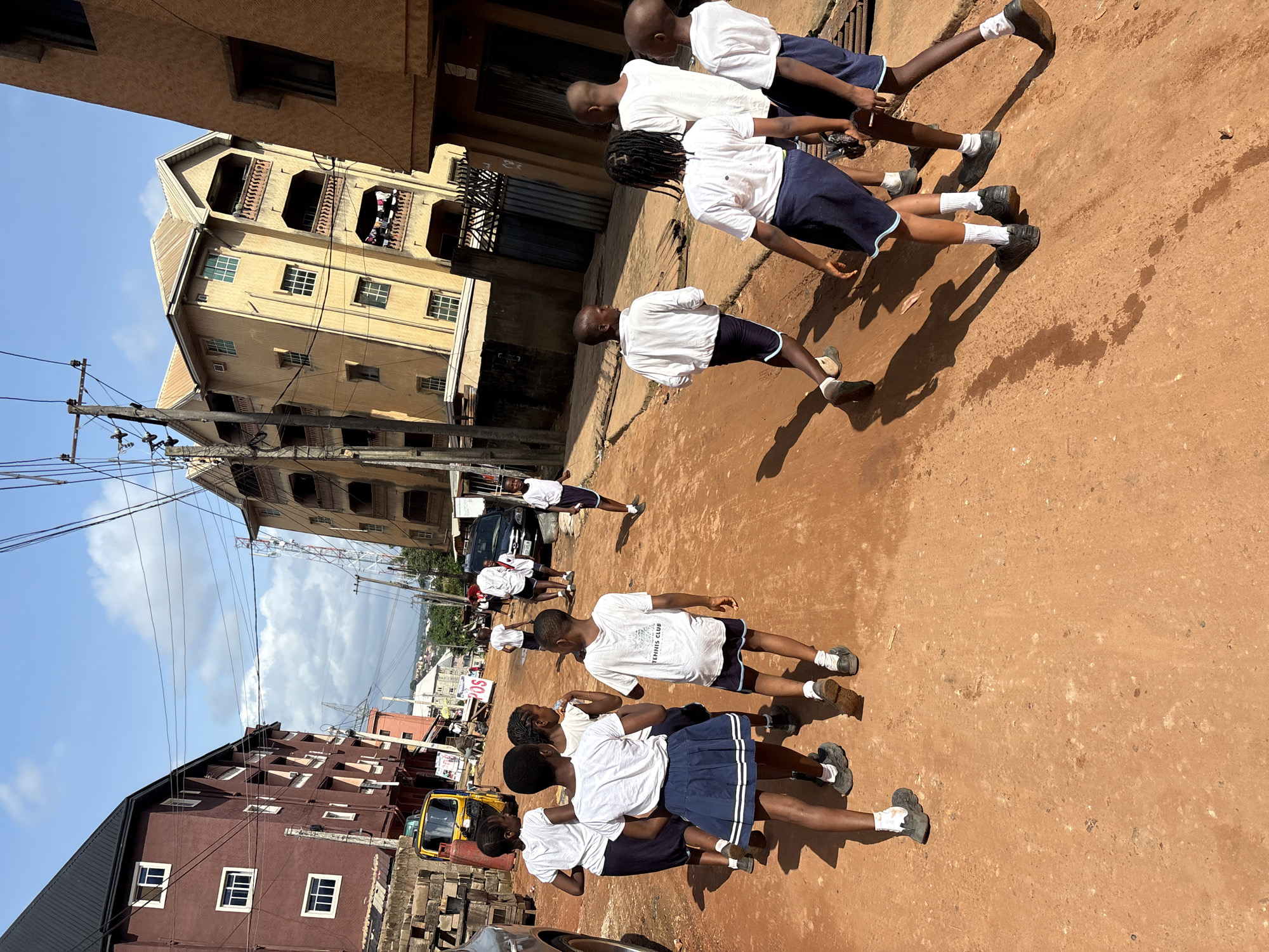 School uniforms, street scenes, and small curiosities across Onitsha and Nkpor