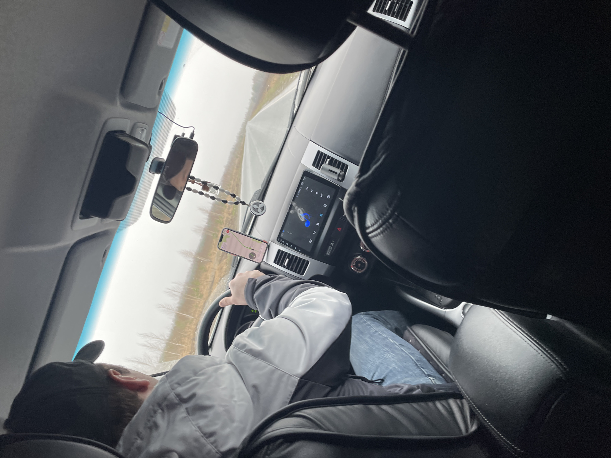 Driver photographed in vehicle interior in Sidorovy Gory, Russia
