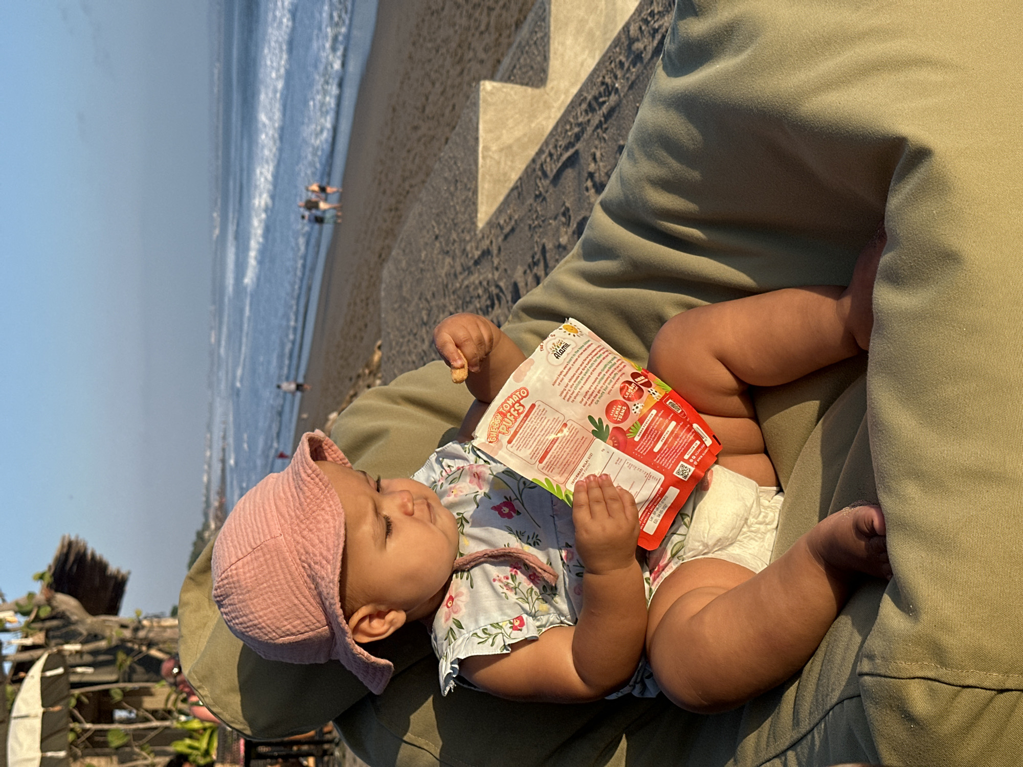 Family enjoys beach day with snacks in North Kuta