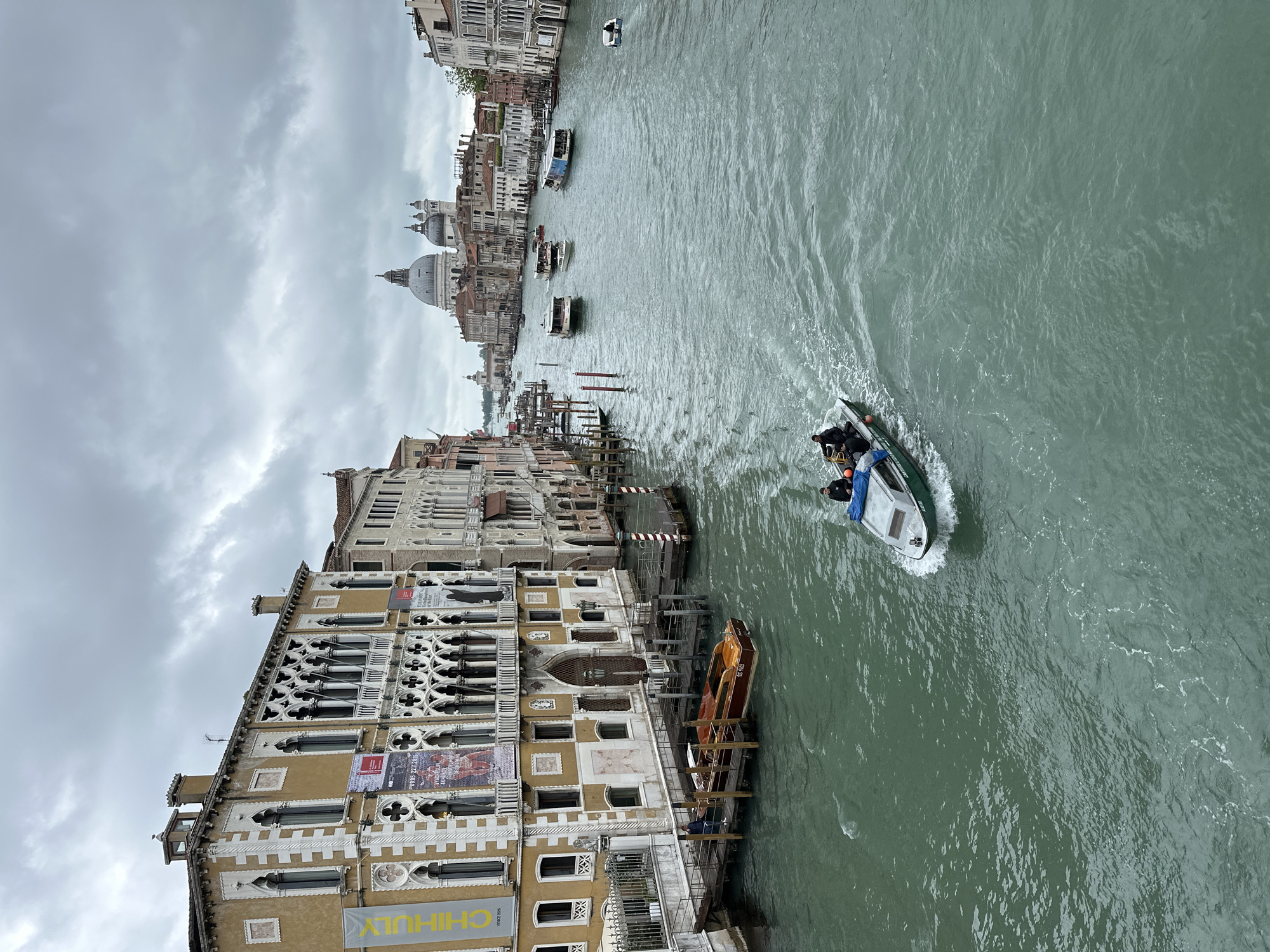 Venice Grand Canal documented under cloudy afternoon skies