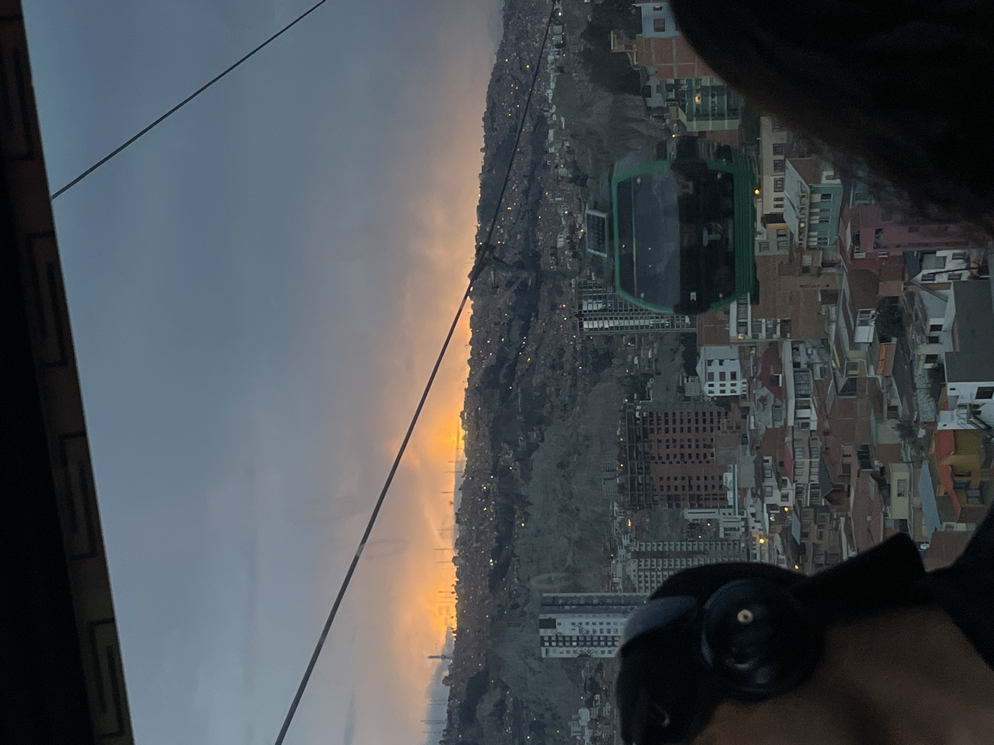 Cable car passenger captures sunset panorama over La Paz