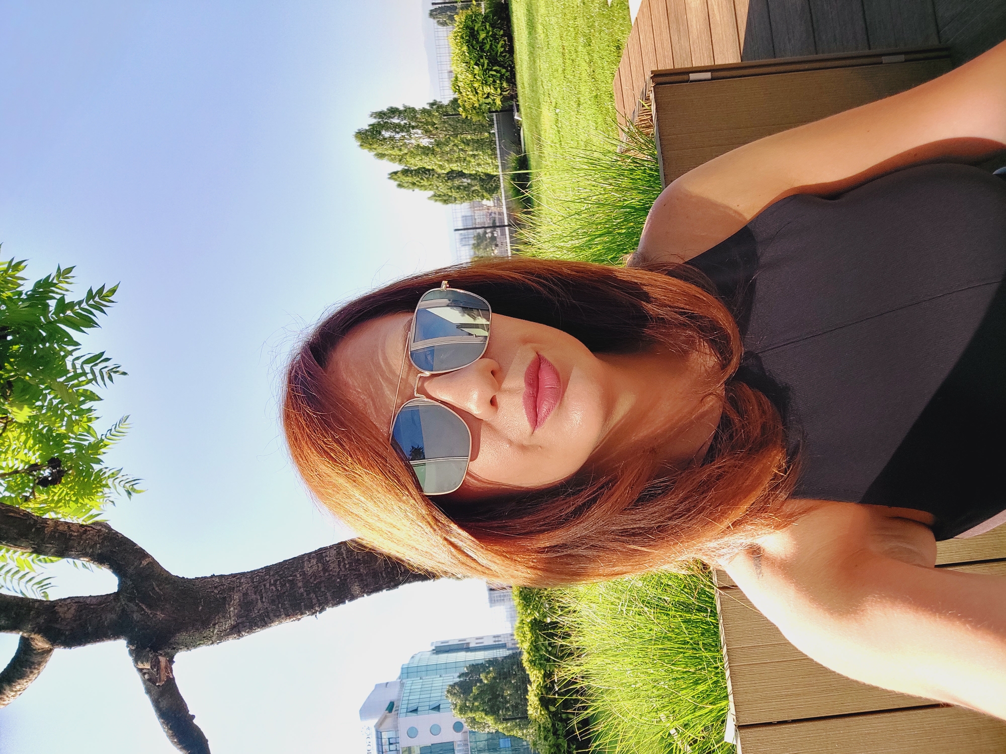 Selfie session near a glass building in Sofia