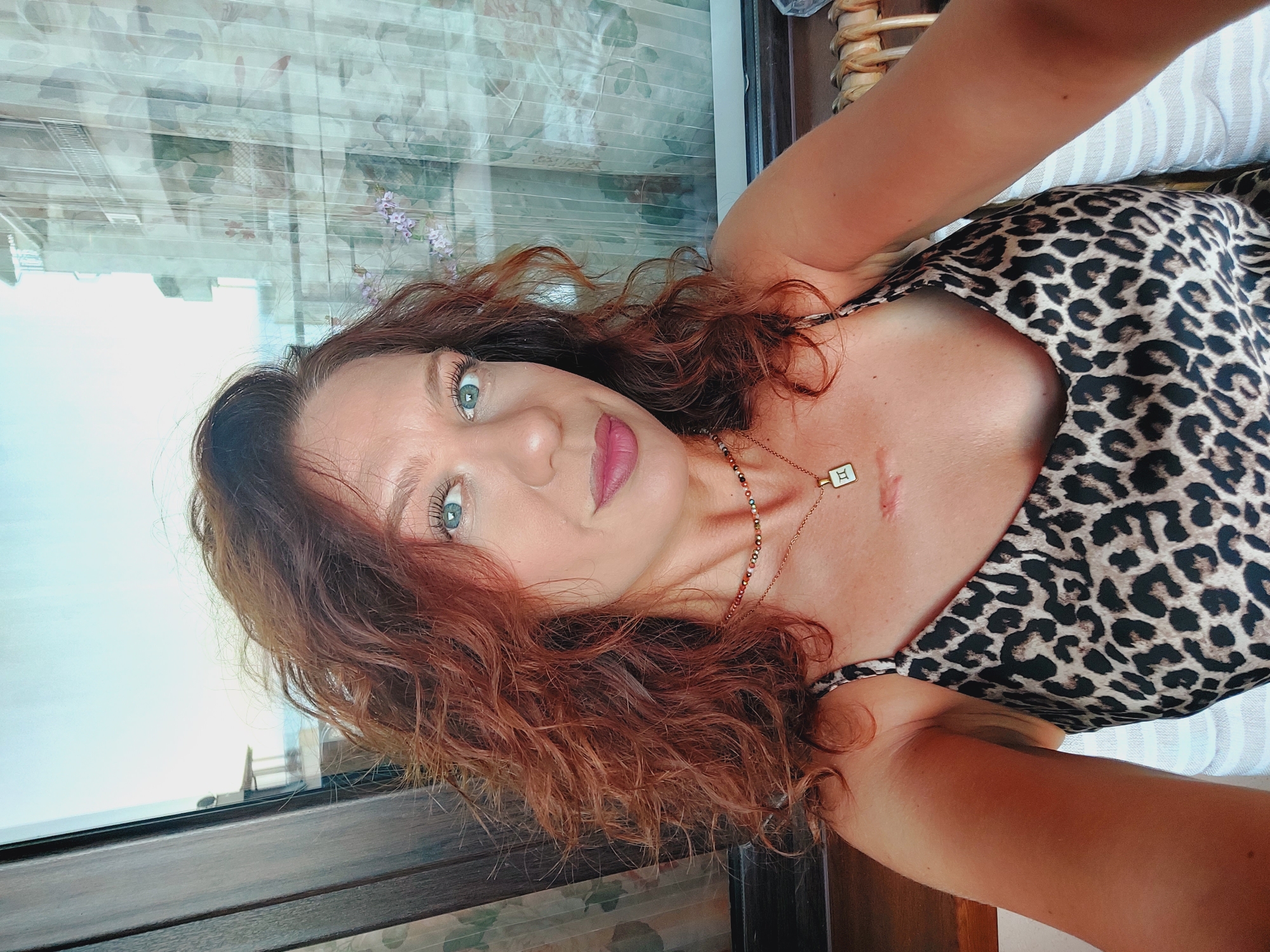 Selfie series in Ravda, Bulgaria, leopard dress and gold-rimmed glasses