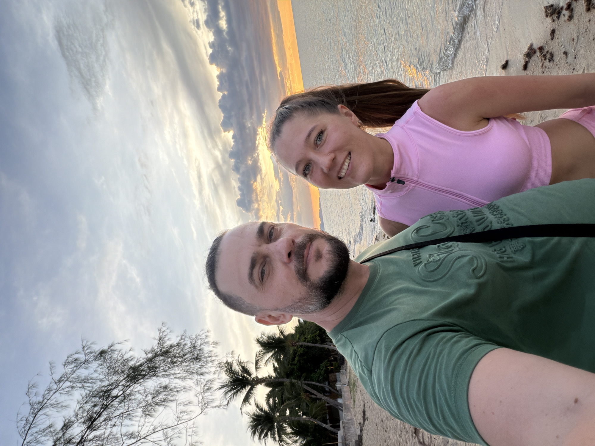 Beach sunset gathering with selfies and dog at Baan Thong Po
