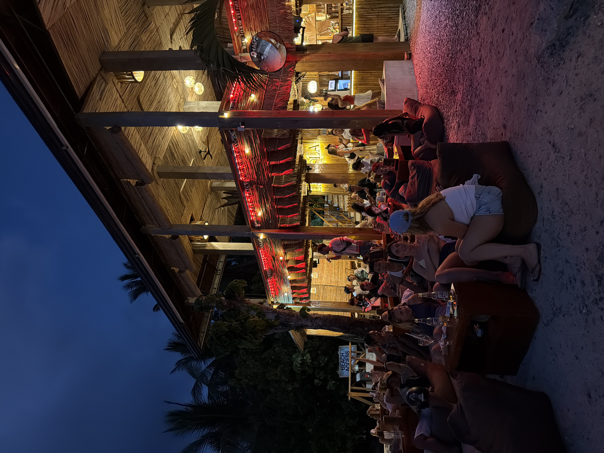 Evening beachfront dining scene documented in General Luna, Philippines