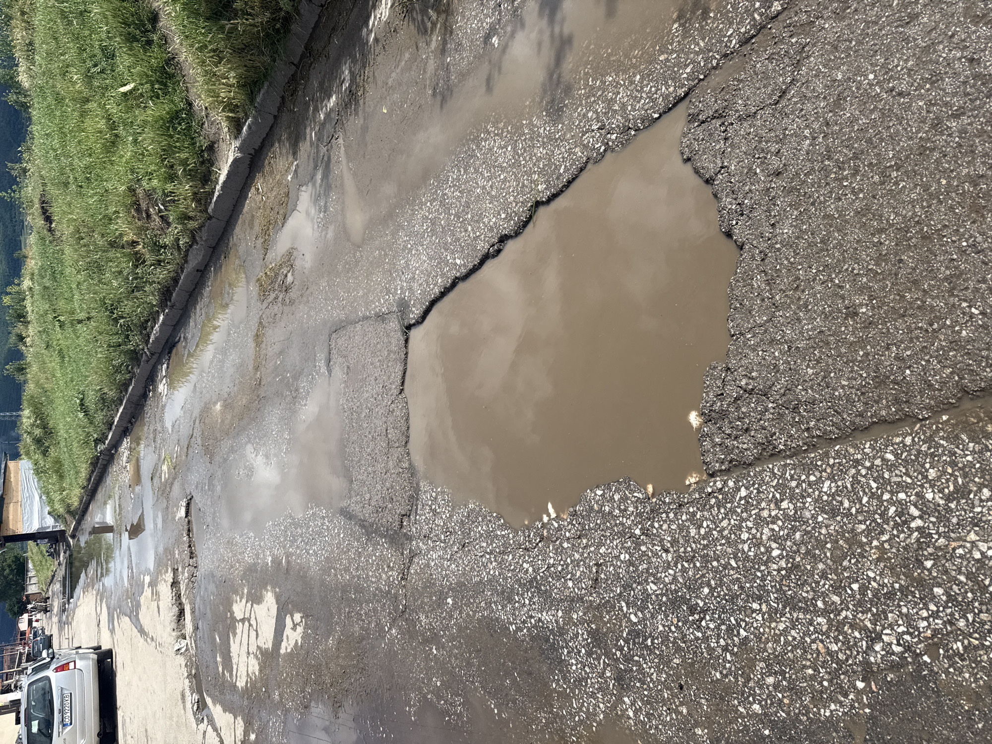 Mixed everyday scenes captured including damaged roads and personal items