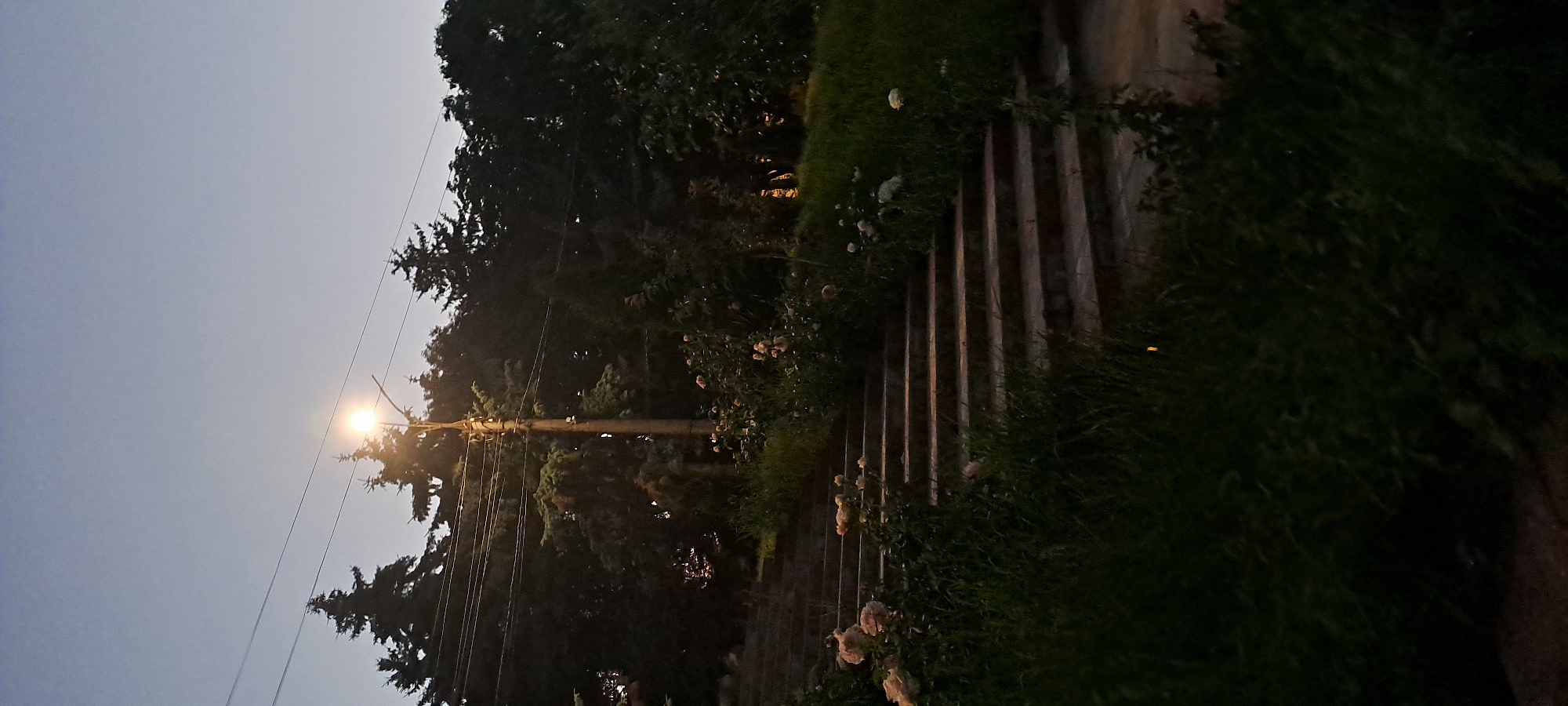Dusk settles over a small Moldovan village in summer
