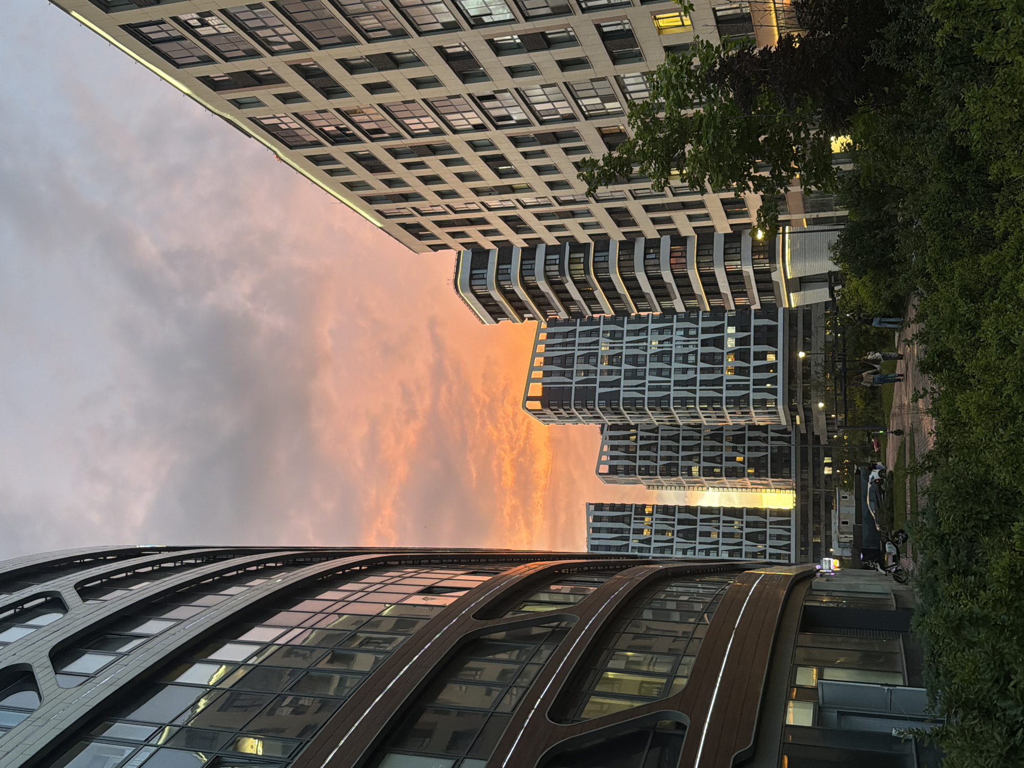 Dusk at Moscow's Symphony complex, sunset sky and selfies