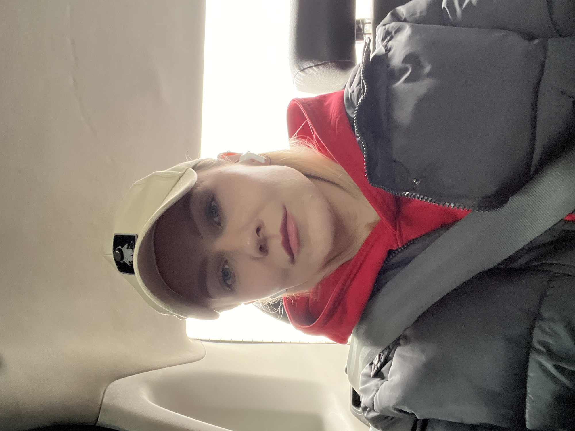 Woman takes selfie in vehicle in Moscow