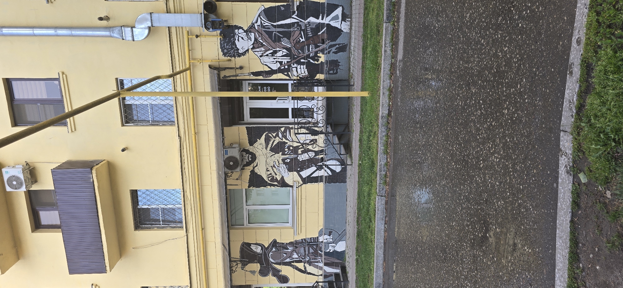 Yellow building with Chechen murals observed in Grozny