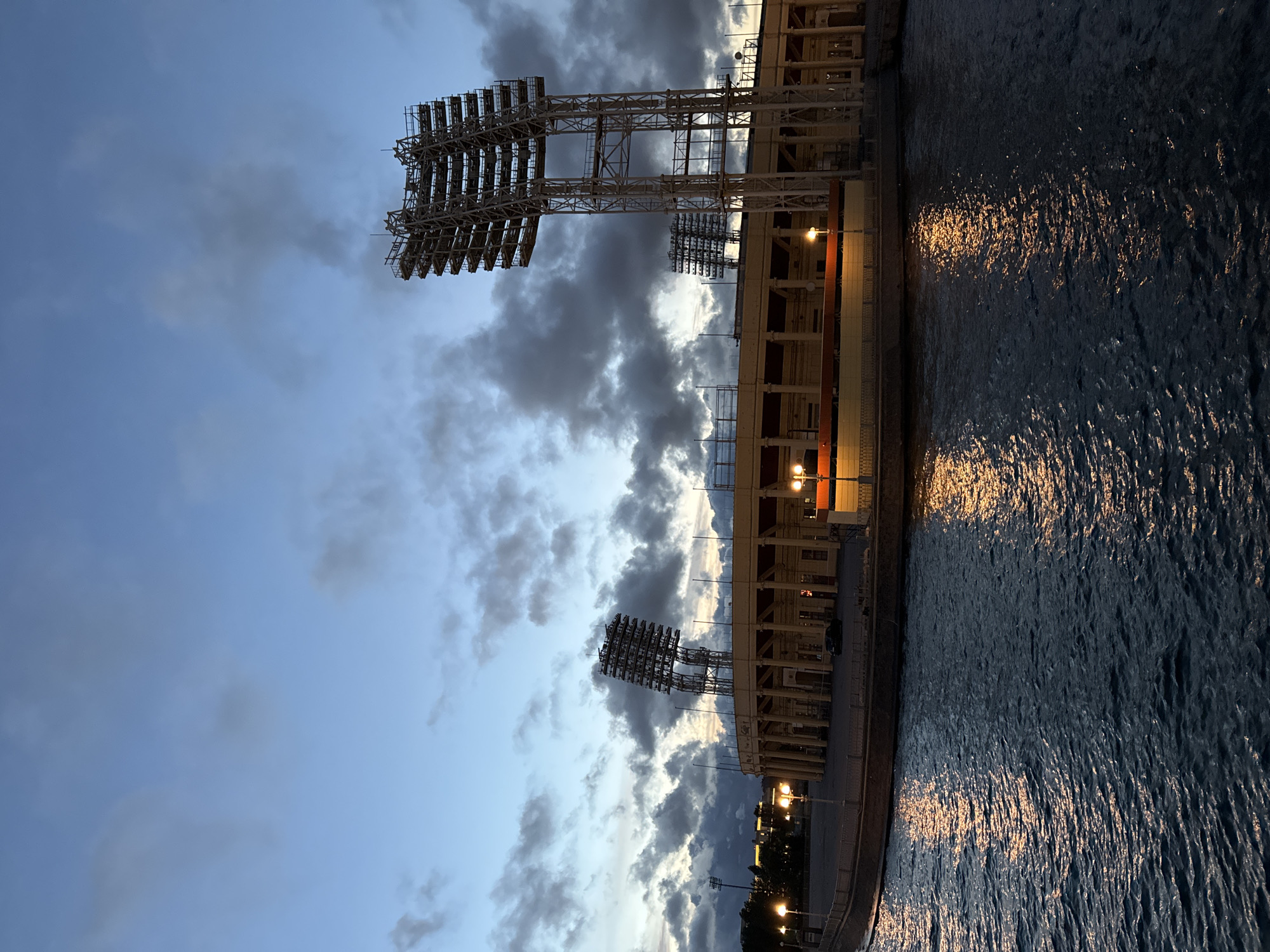 Petrovsky Stadium and Saint Petersburg waterfront at dusk