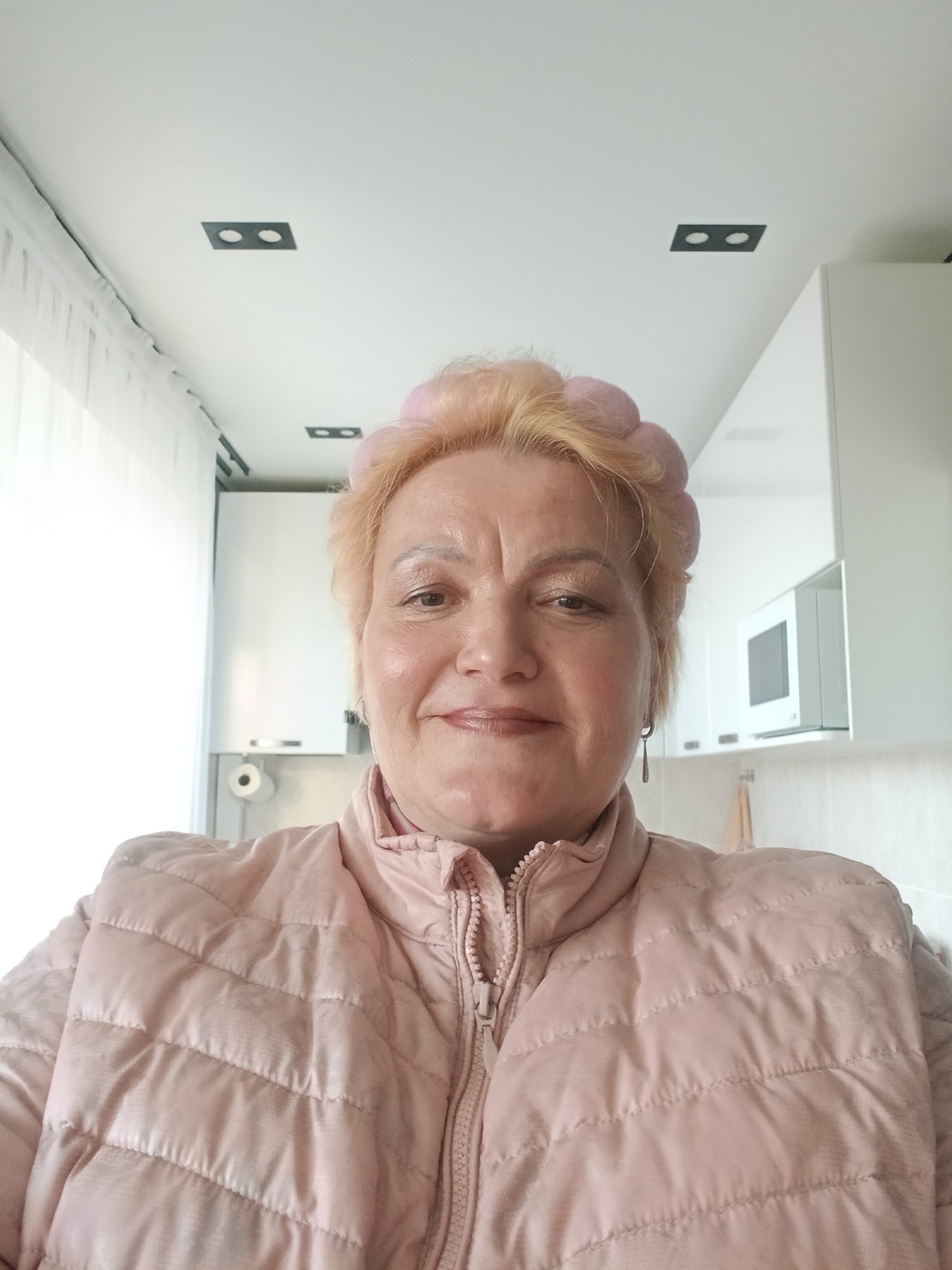 Elderly woman takes selfies at home in Murom, Russia