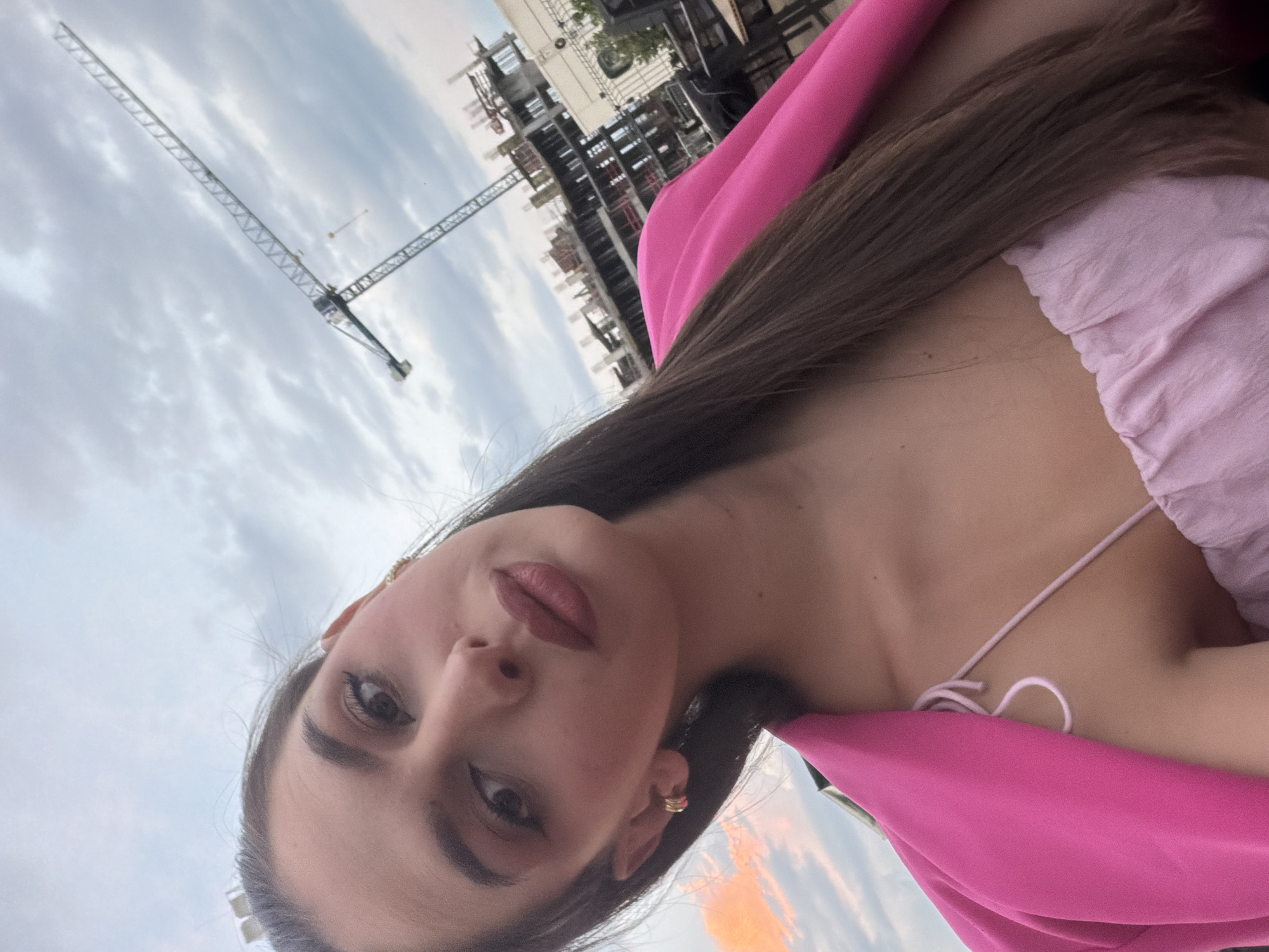 Pink-themed rooftop party above the Sofia skyline