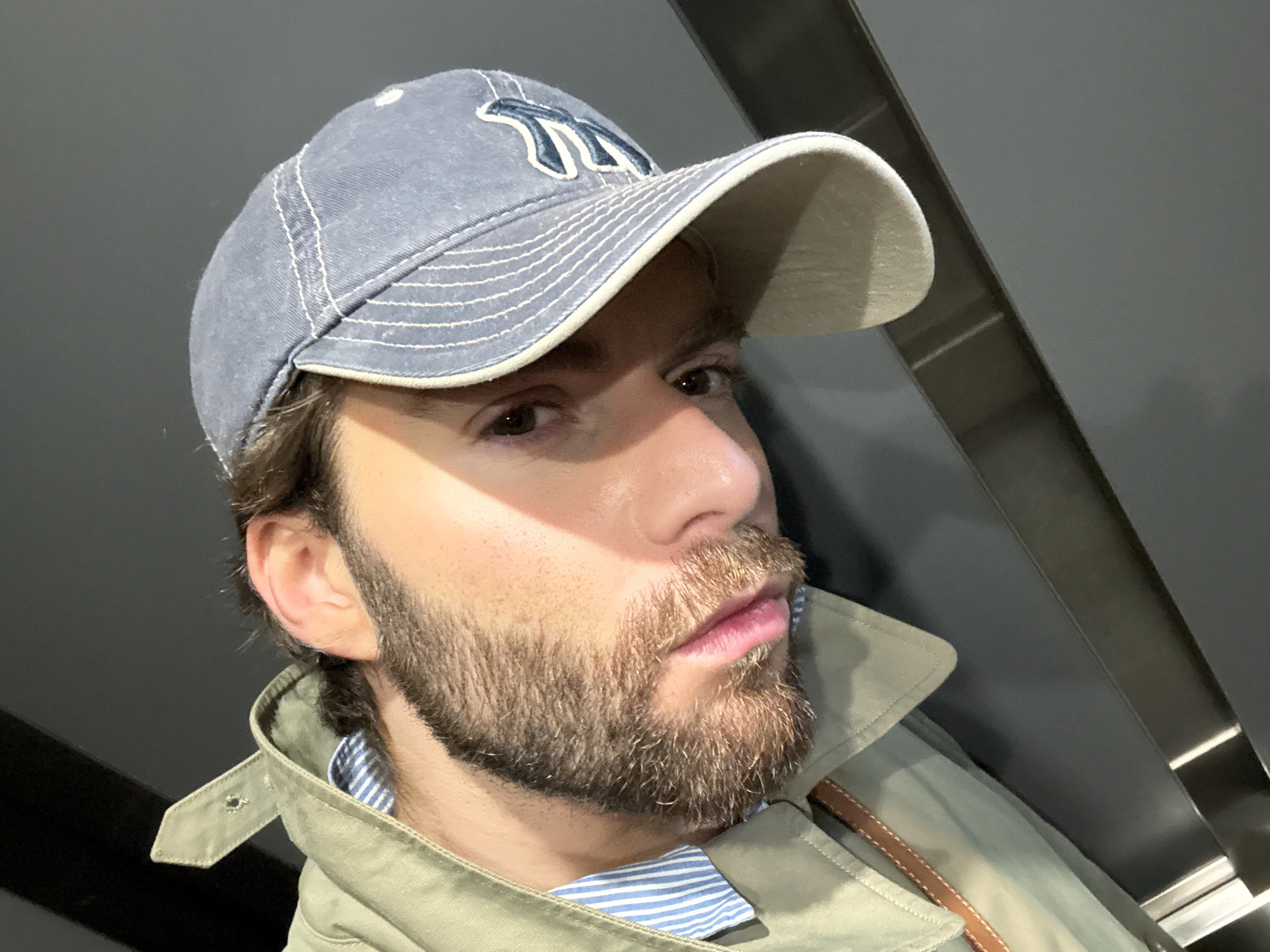 Man in Yankees cap photographed making faces in Montreal