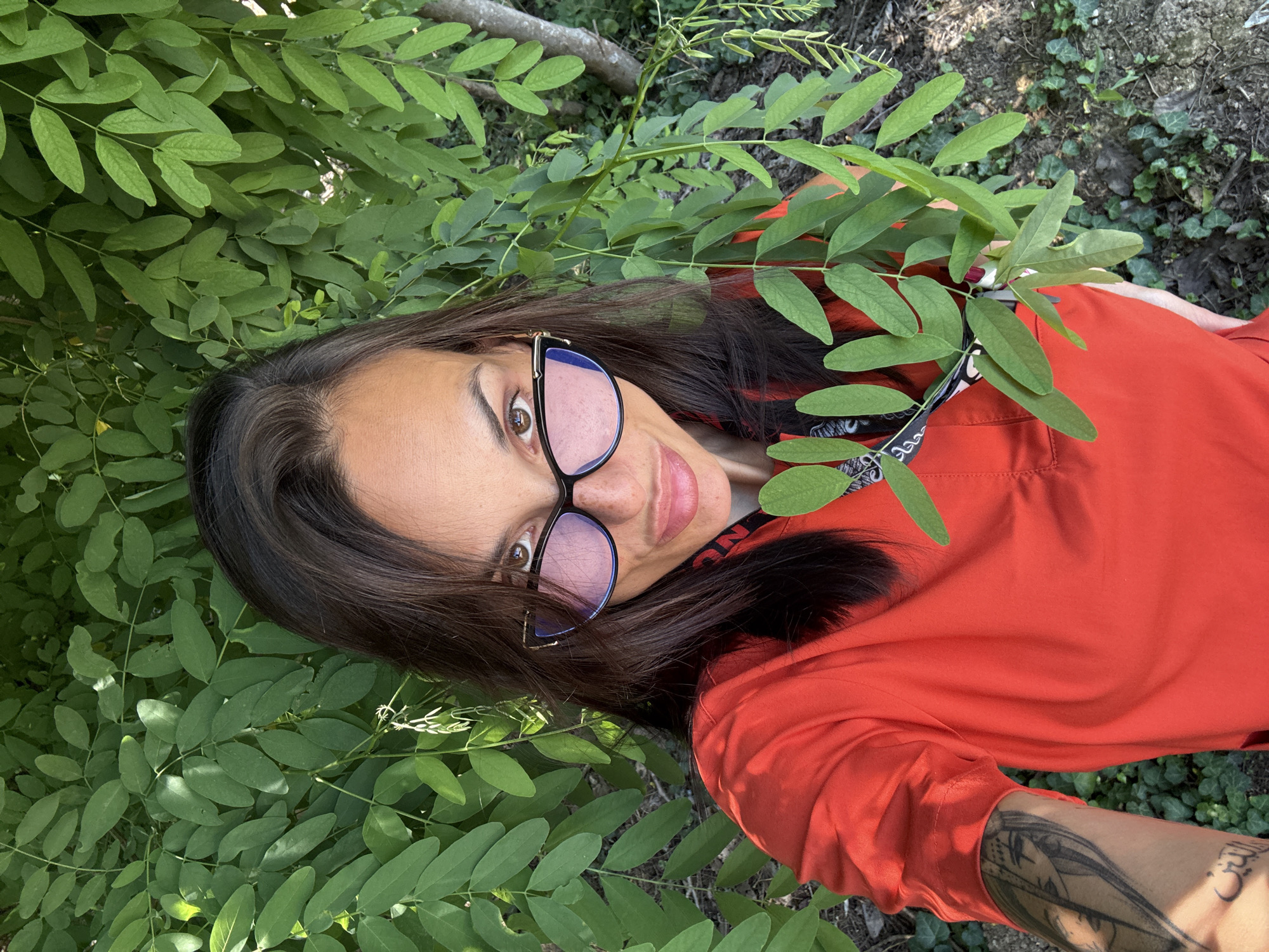 Outdoor selfies near a Pleven medical facility, mid-morning break