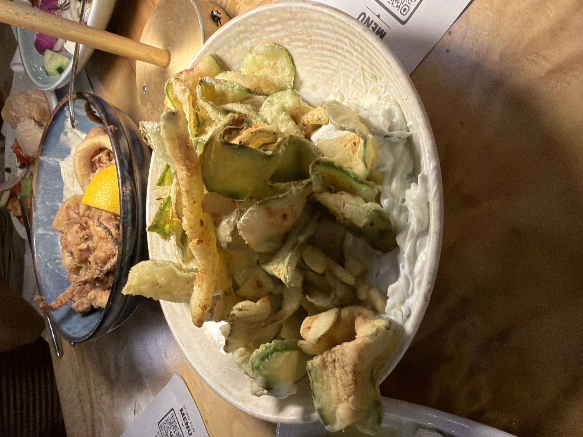 Evening dining experience captured at Greek taverna in Makri
