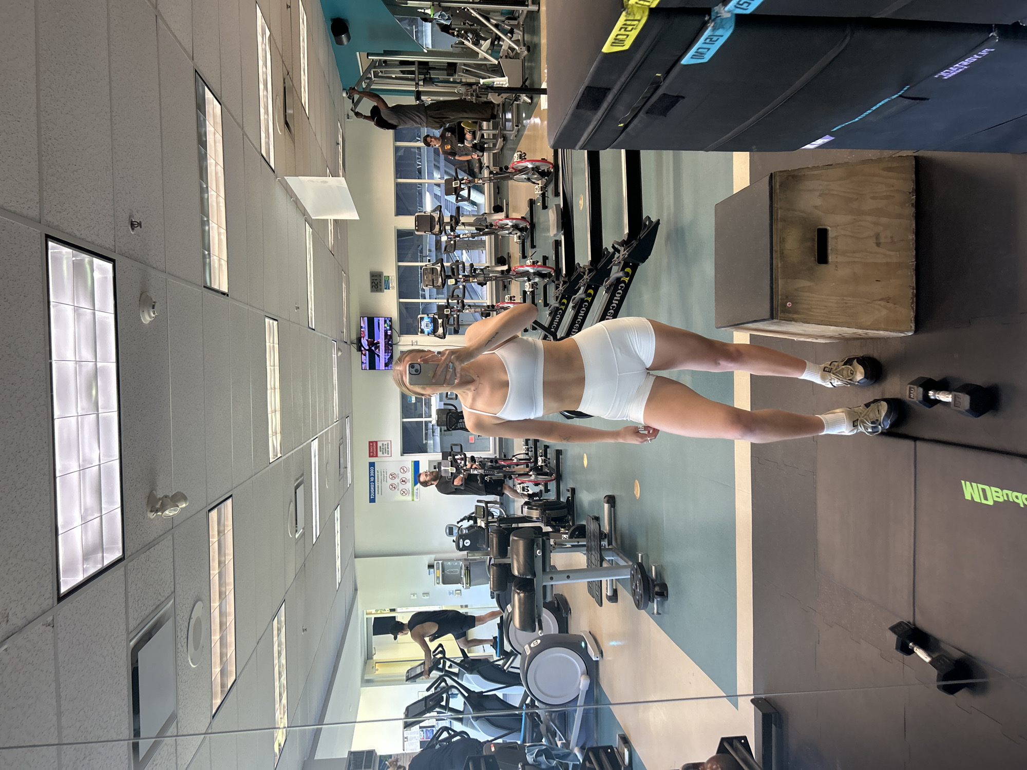 Woman takes gym selfie in Whistler fitness center