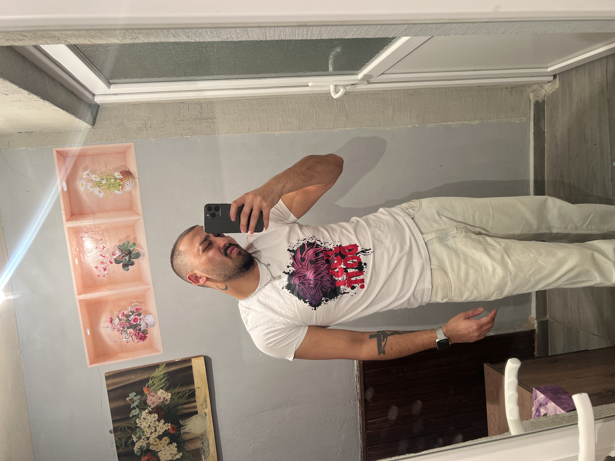 Man takes multiple selfies indoors in Shumata, Bulgaria