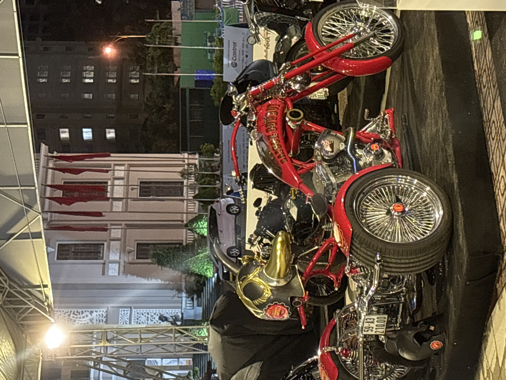 Custom motorcycles displayed at indoor exhibition in Nha Trang