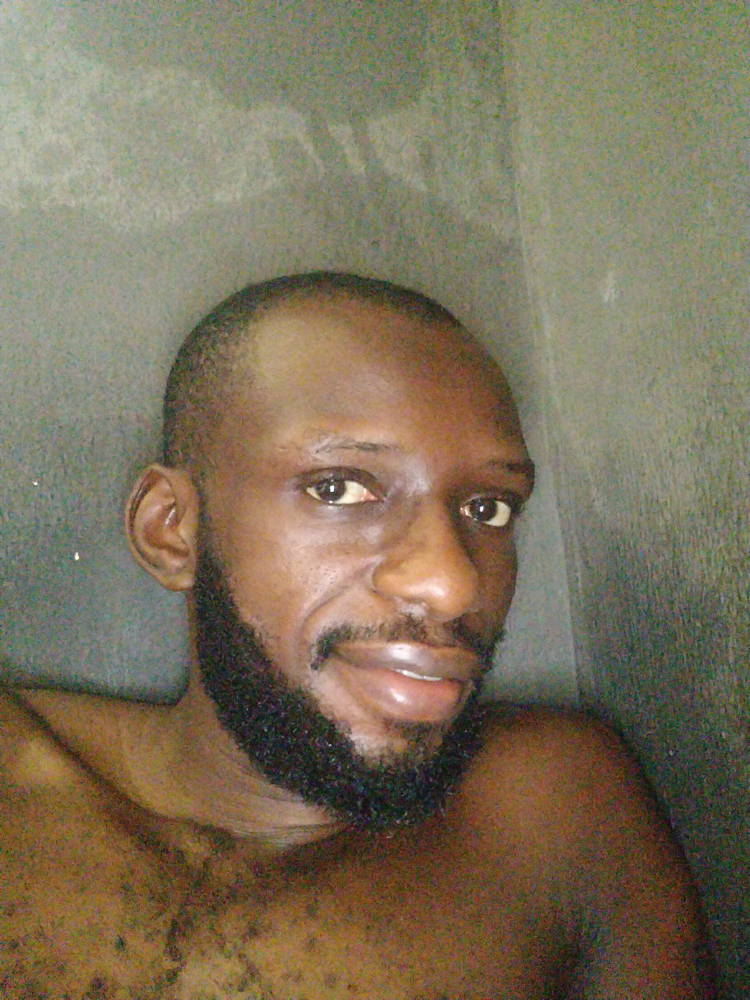 Man photographed indoors in Uyo, Nigeria
